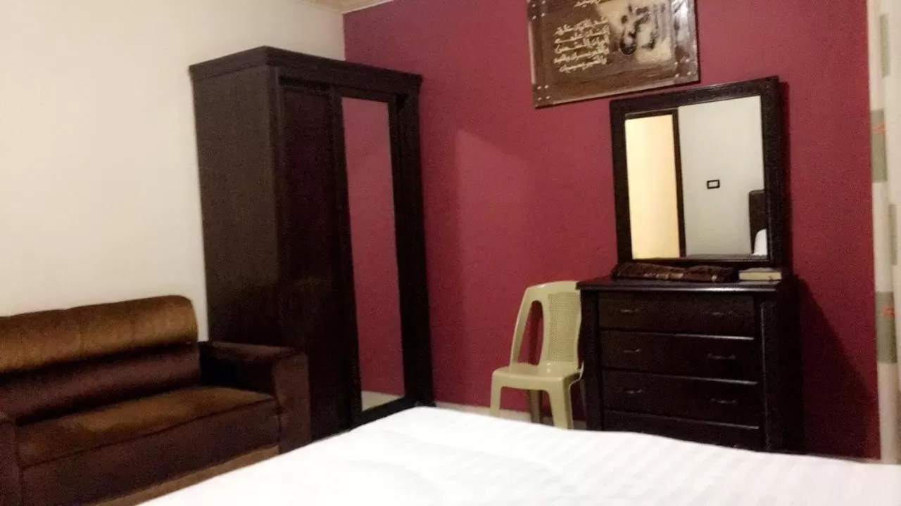 Bed in Al Tawheed Hotel Apartments