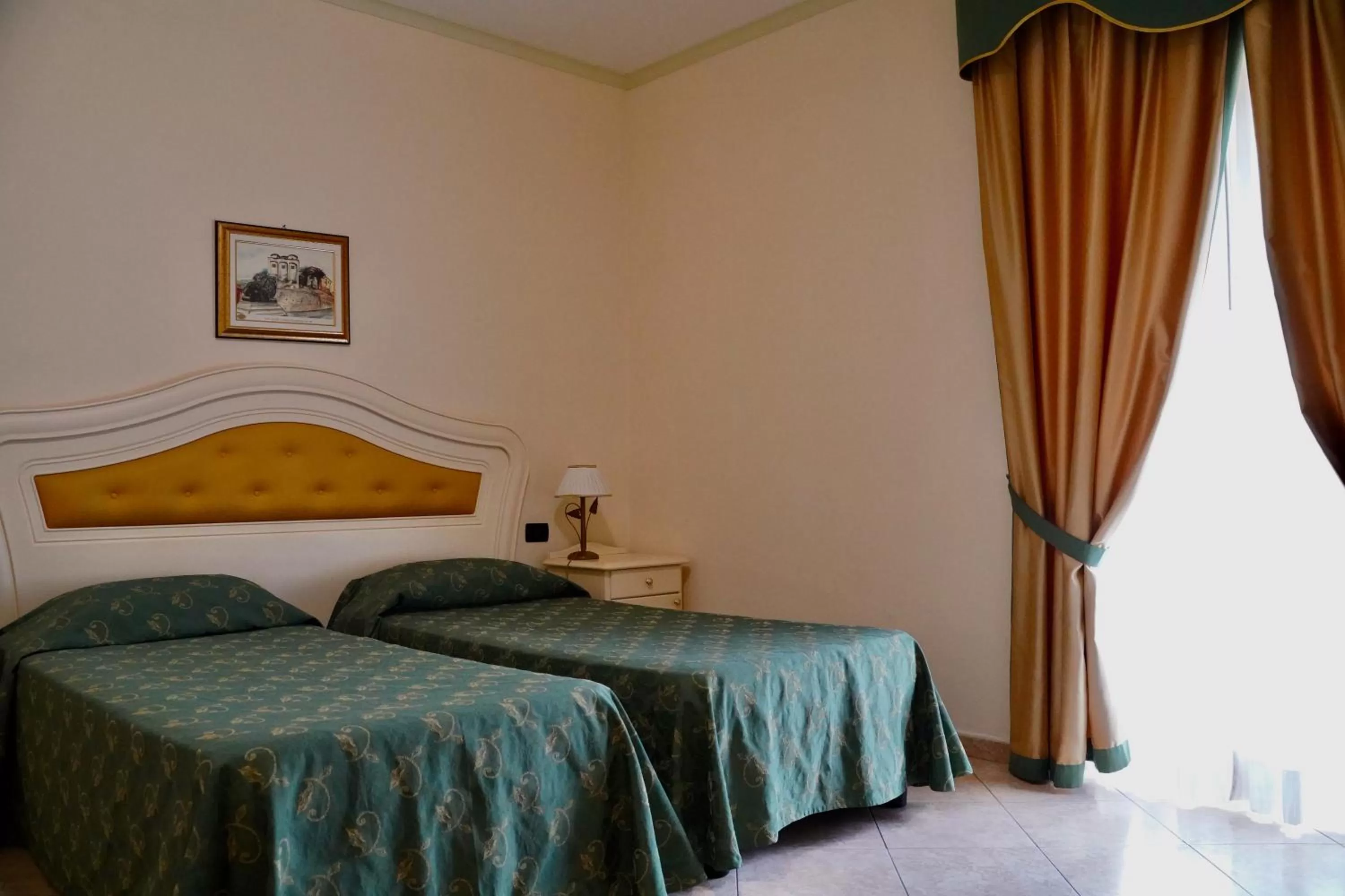 Bedroom in Hotel Roscianum Welness SPA