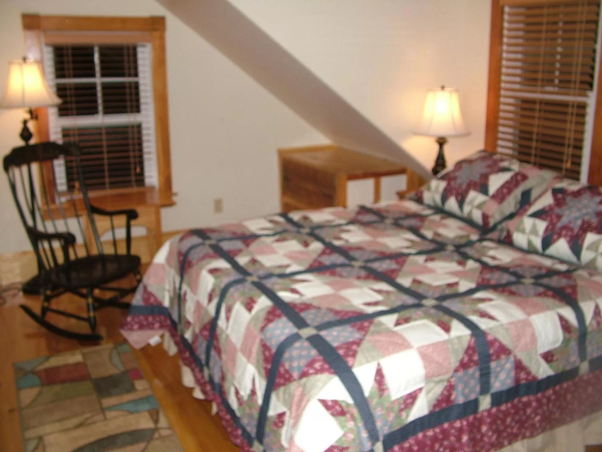 Bed in Beach Cottage Inn