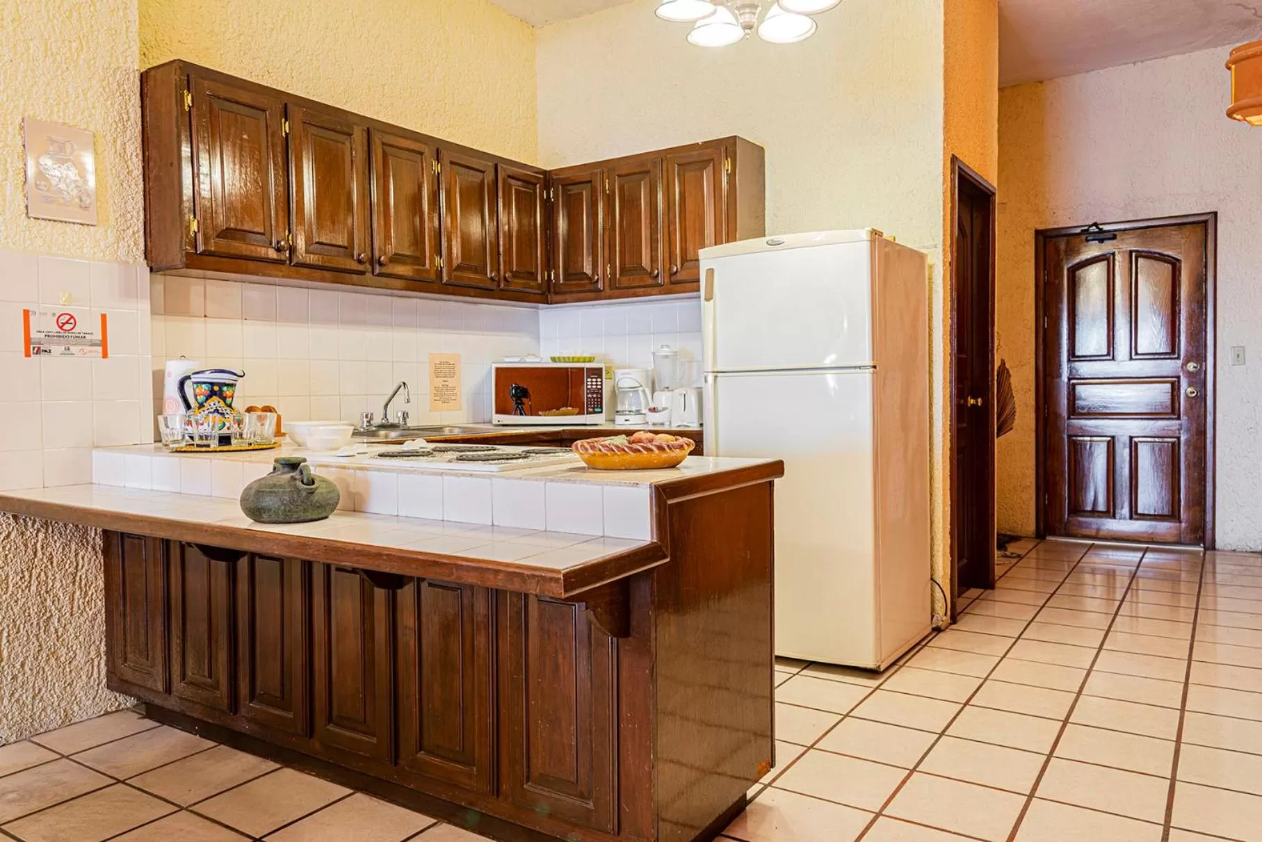 Kitchen or kitchenette in Las Gaviotas Condo-Hotel La Paz BCS