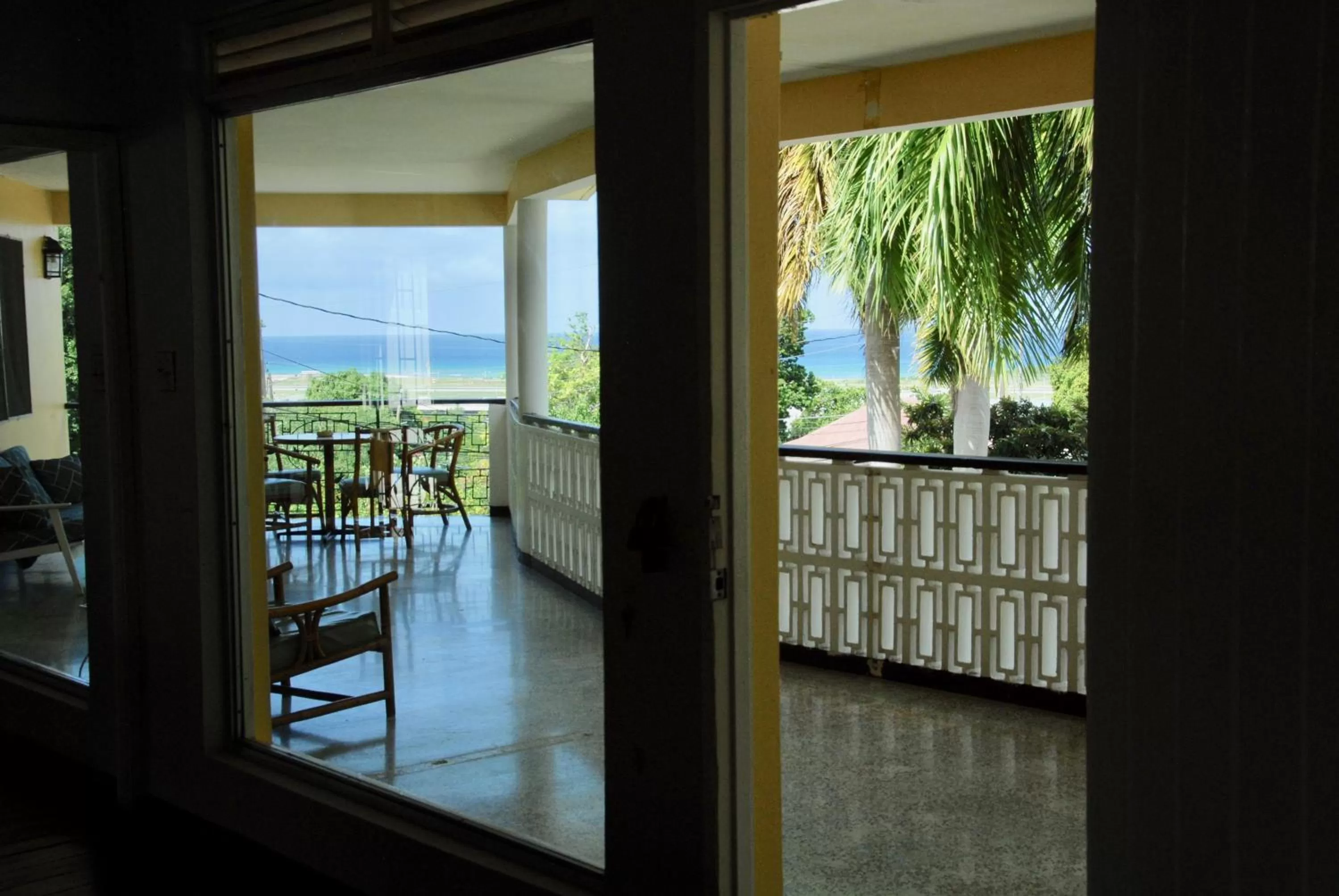 Balcony/Terrace, Pool View in The Blue Orchid B&B