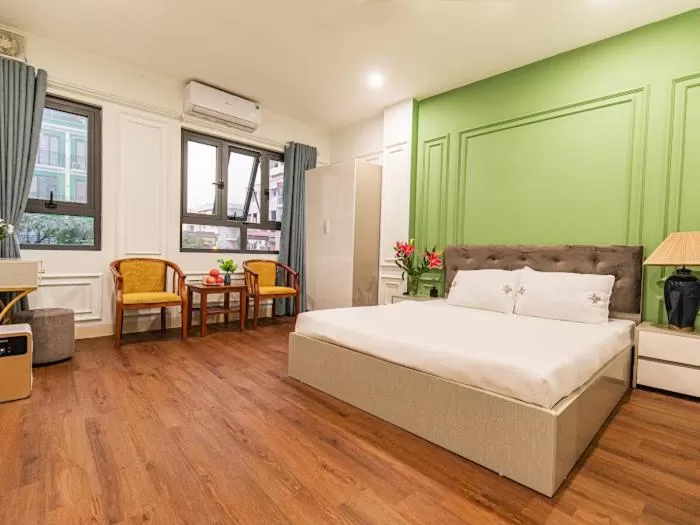 Living room, Bed in Madelise Max Hotel