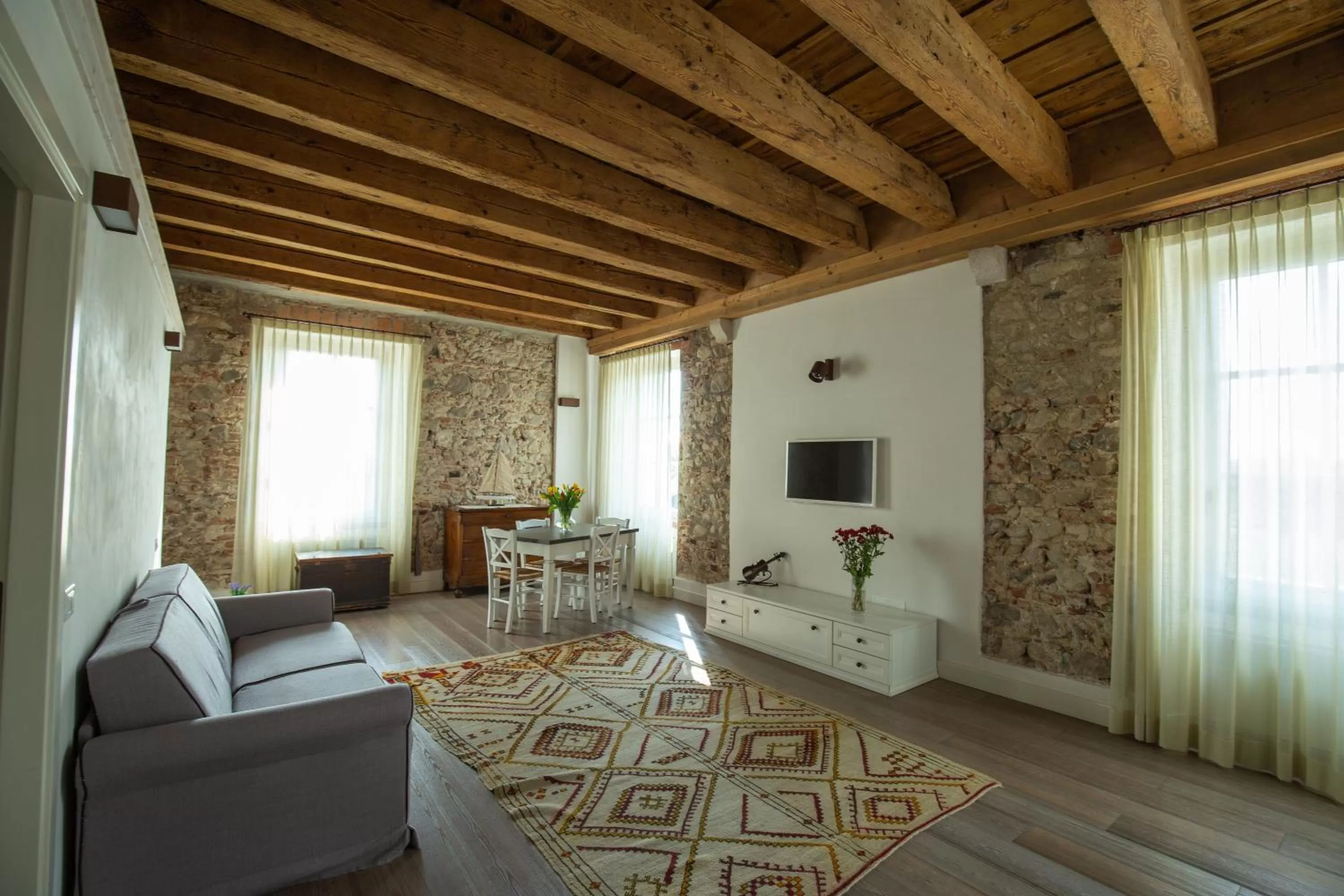Living room in Residence Corte San Carlo