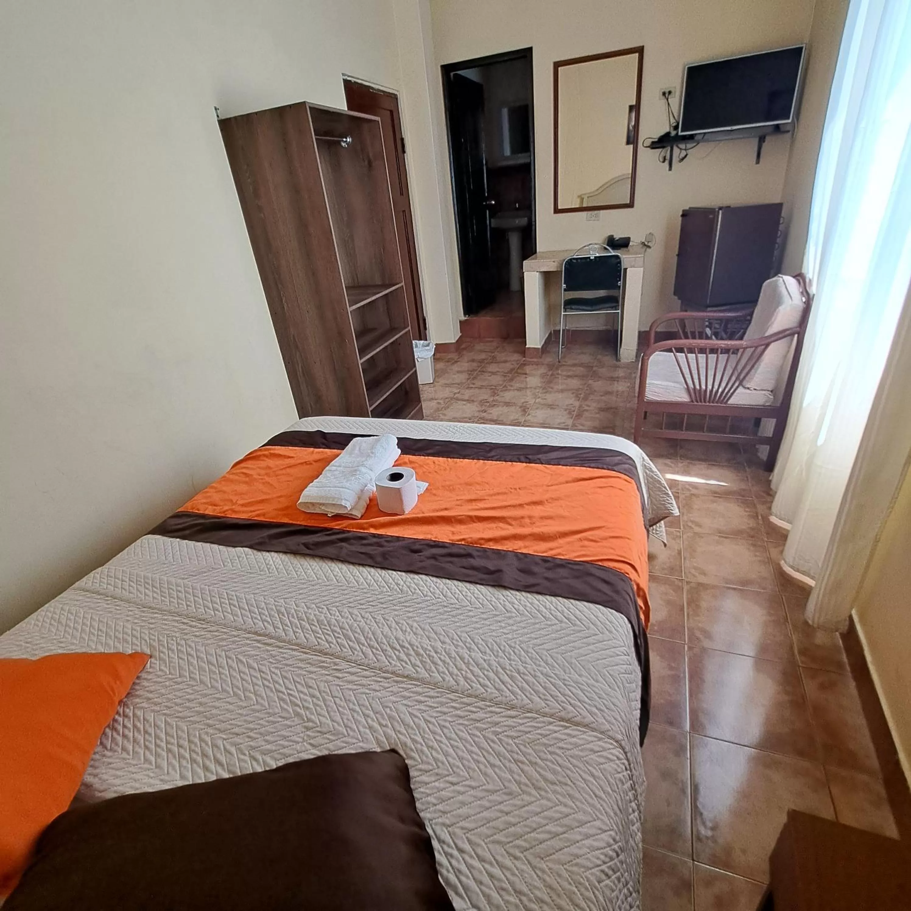 Bedroom, Bed in Atlantic Suites Hotel