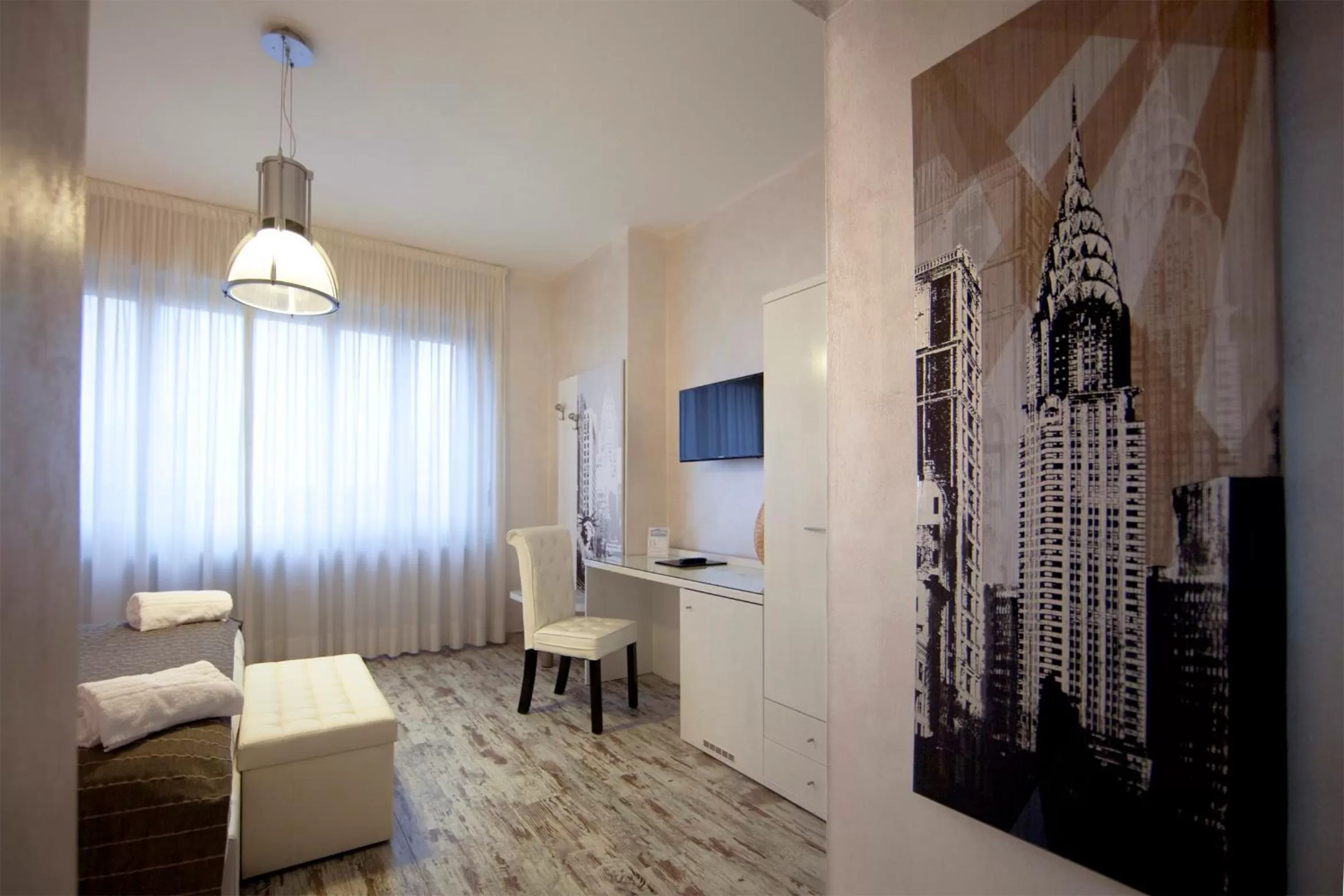 Decorative detail, Bed in Piccolo Hotel Allamano