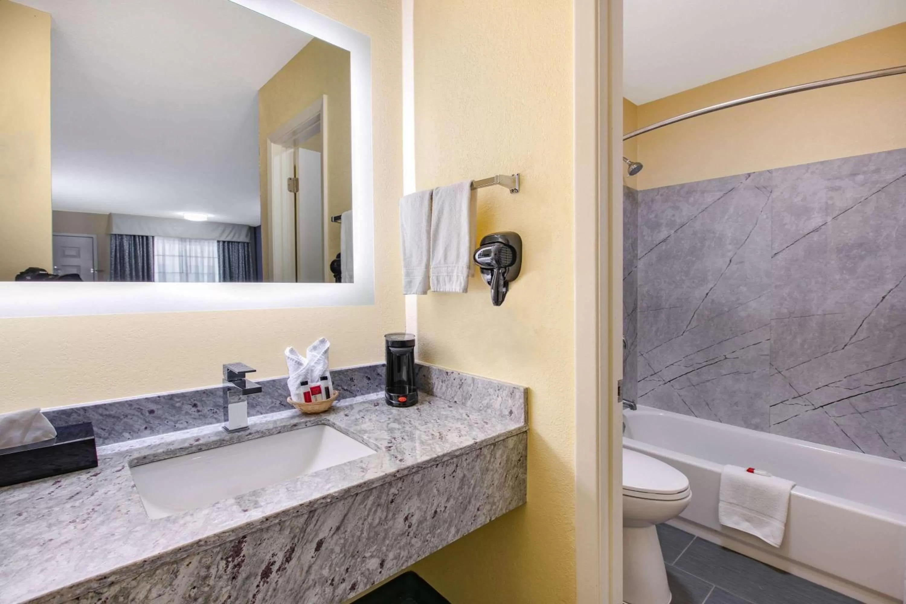 Bathroom in Days Inn by Wyndham Waco Near Downtown University