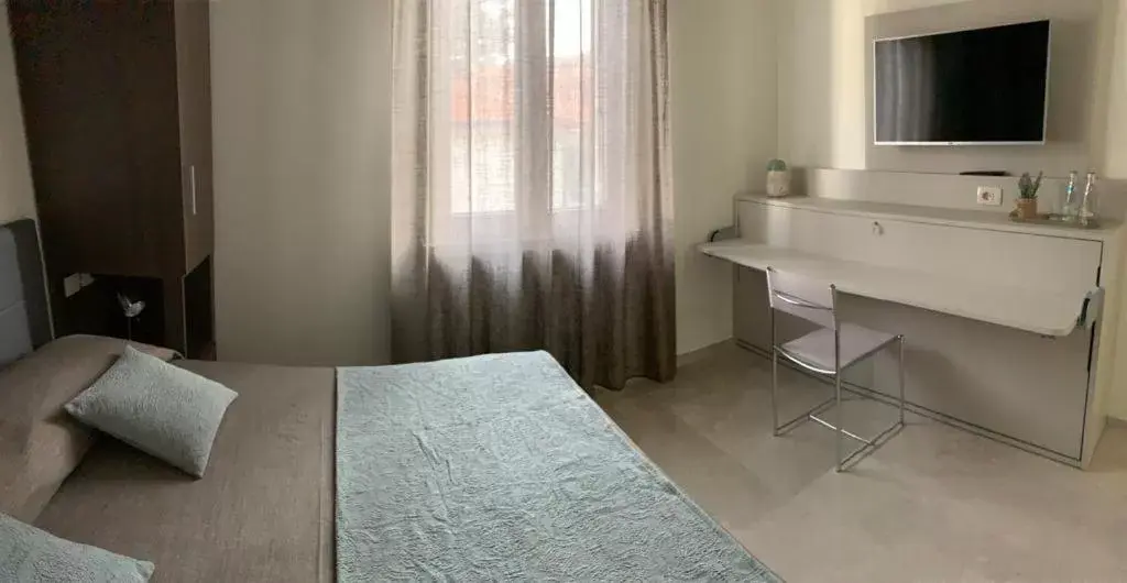 Triple Room with Private Bathroom in B&b estercarlo Triple Room with Private Bathroom in B&b estercarlo