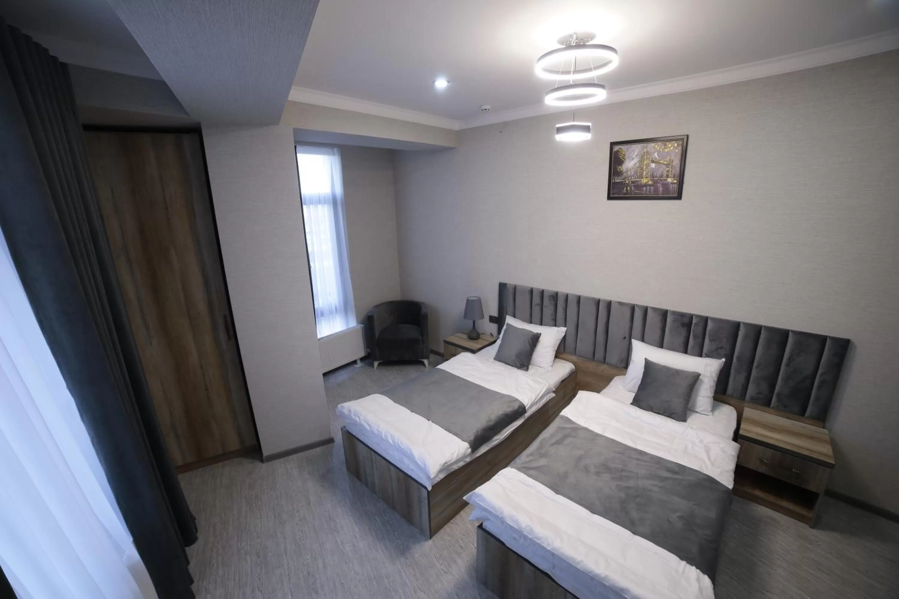 Photo of the whole room, Bed in Samarqand Darvoza