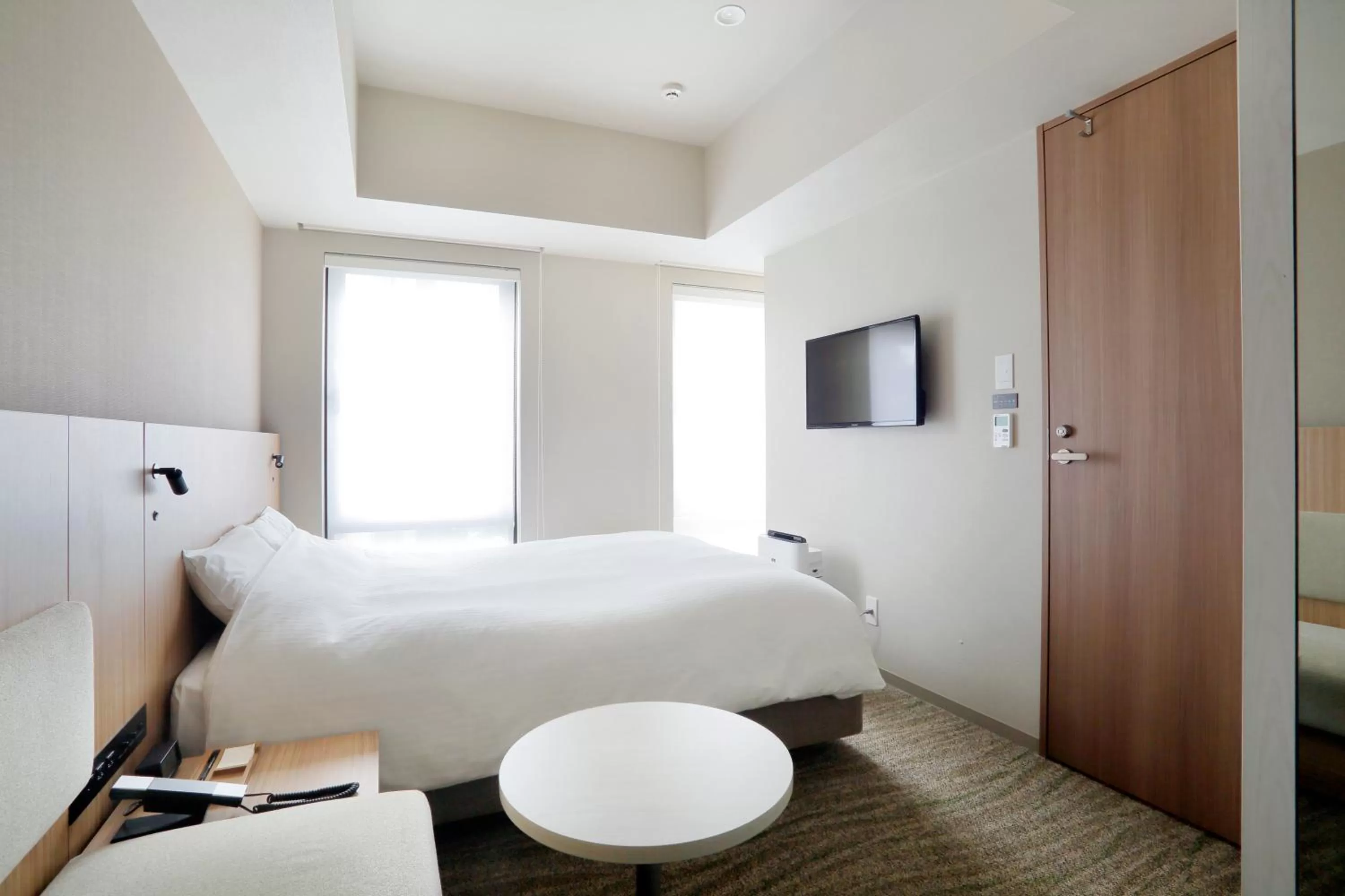 Bed in JR Inn Sapporo-eki Minami-guchi