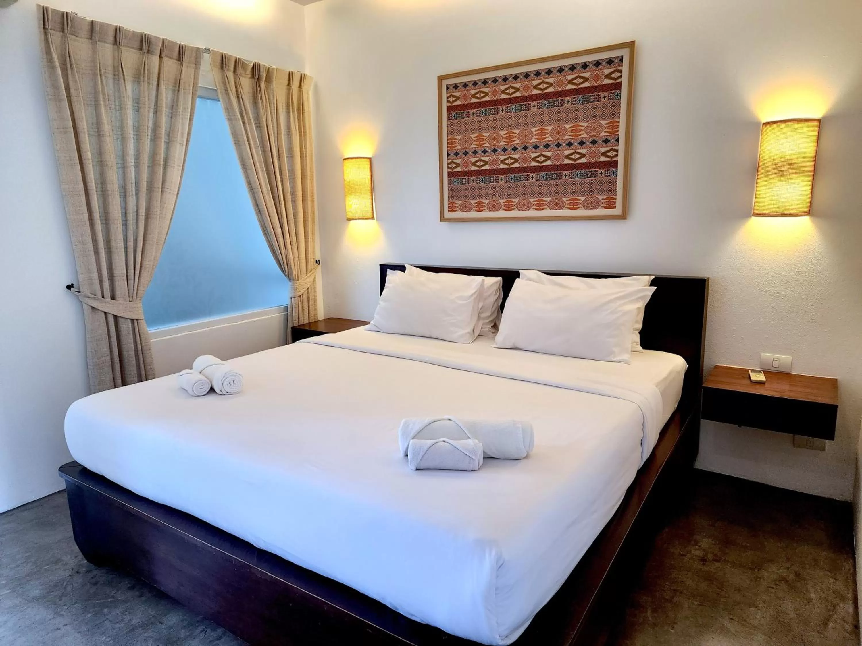 Bed in The Peaberry Boutique Hotel