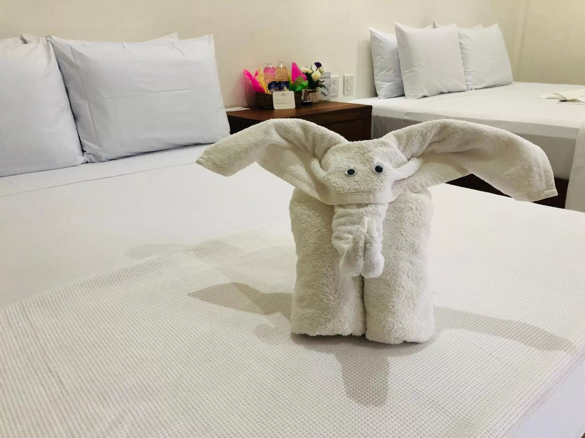 Bed in Los Arcos Hotel - TULUM