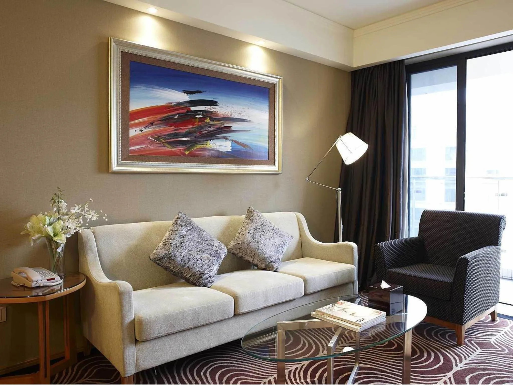 Living room in 广州丹顿行政公寓-Dan Executive Apartment Guangzhou Zhujiang New Town