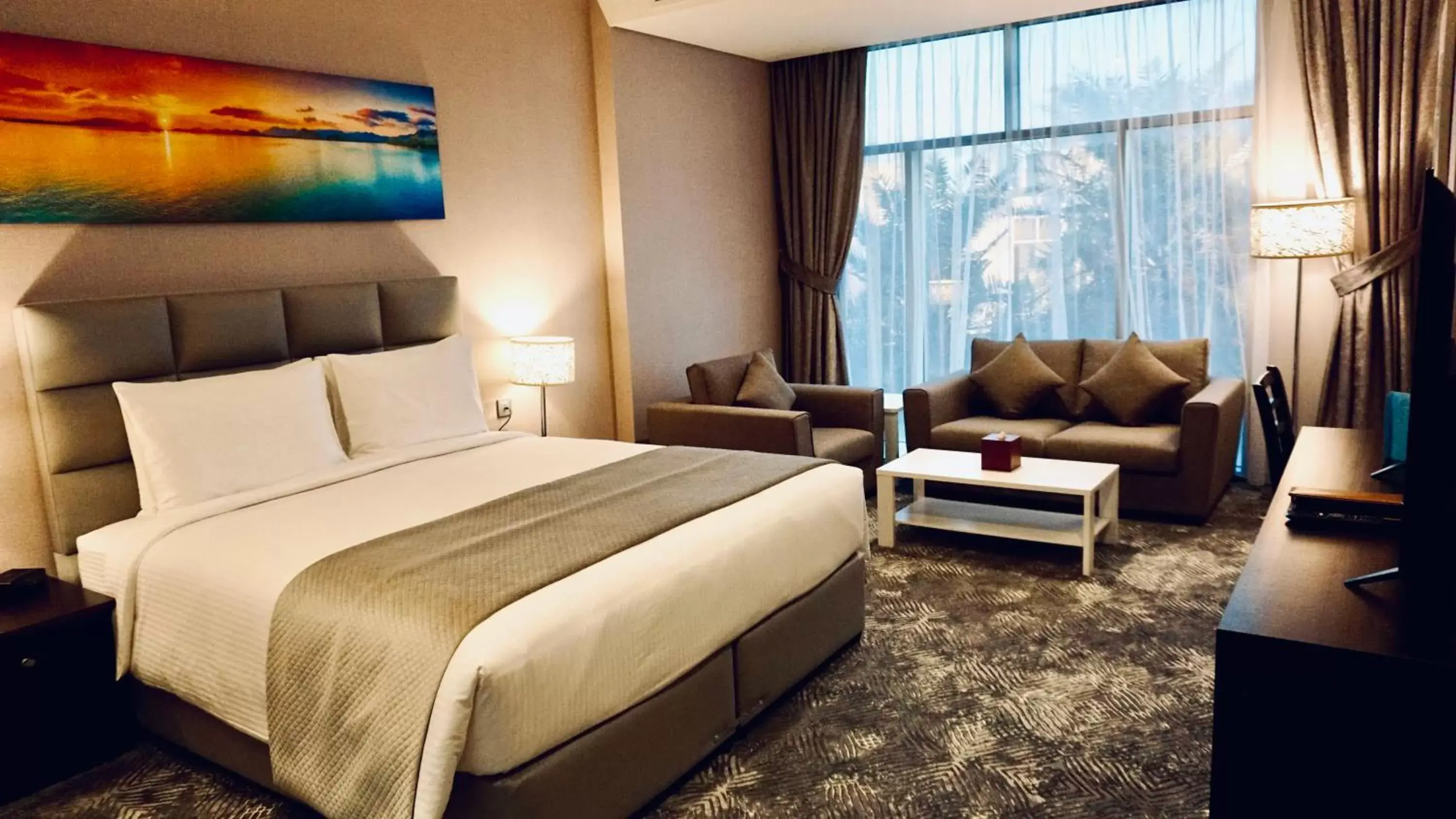 Deluxe King Room with Partial Sea View in Al Kout Beach Hotel Deluxe King Room with Partial Sea View in Al Kout Beach Hotel