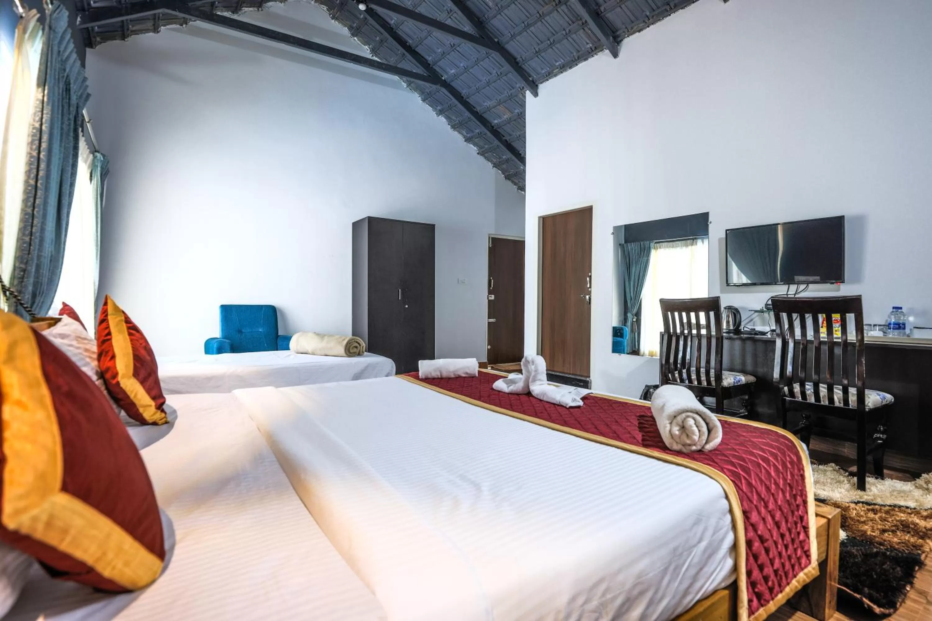 Bed in The Spectrum Resort, Chikmagalur