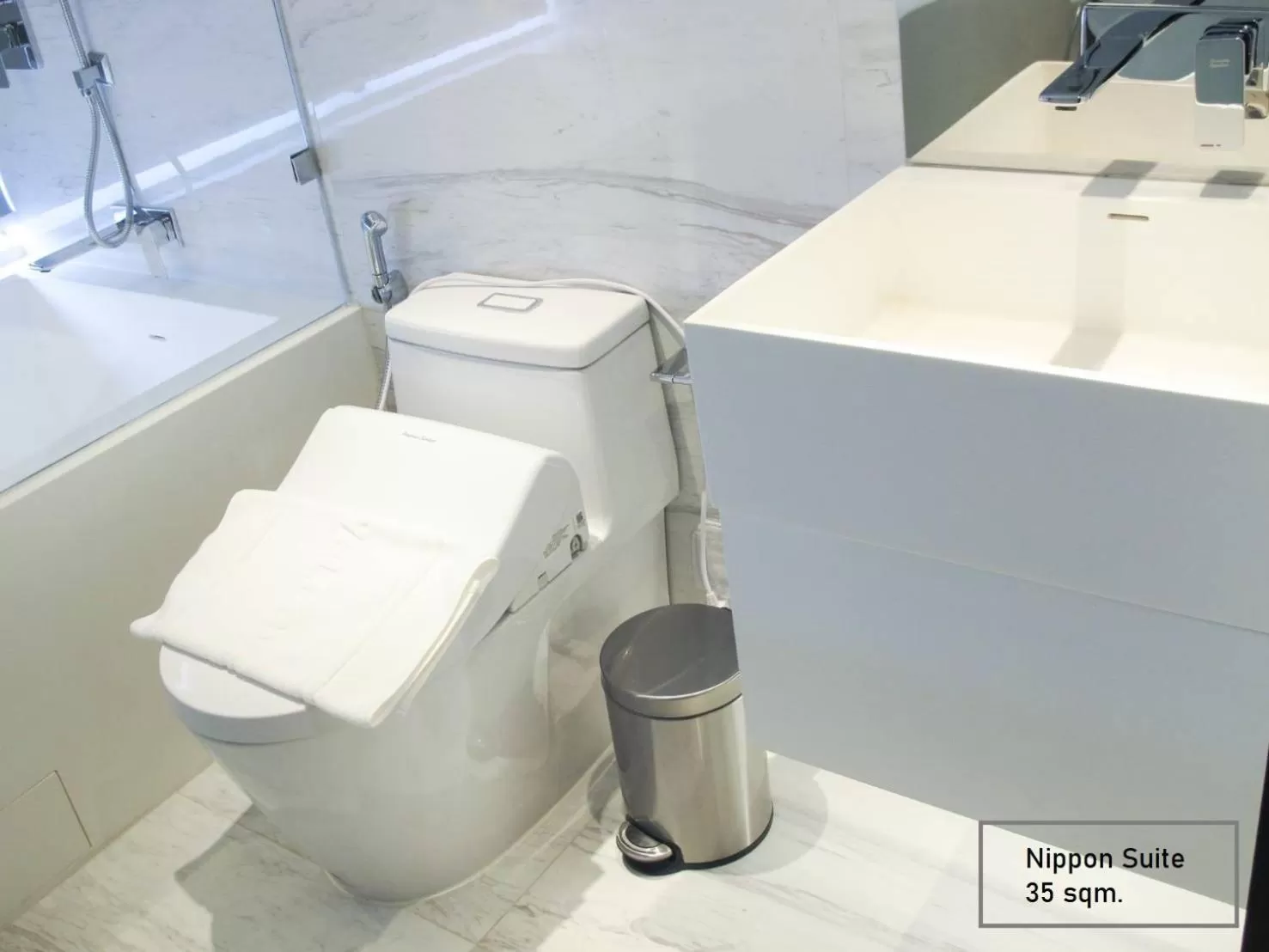 Toilet in ashley hotel bkk