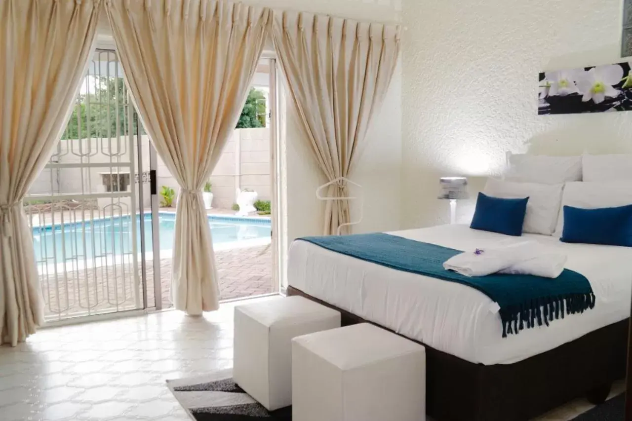 Double Room with Pool View in Moye Guest House Double Room with Pool View in Moye Guest House