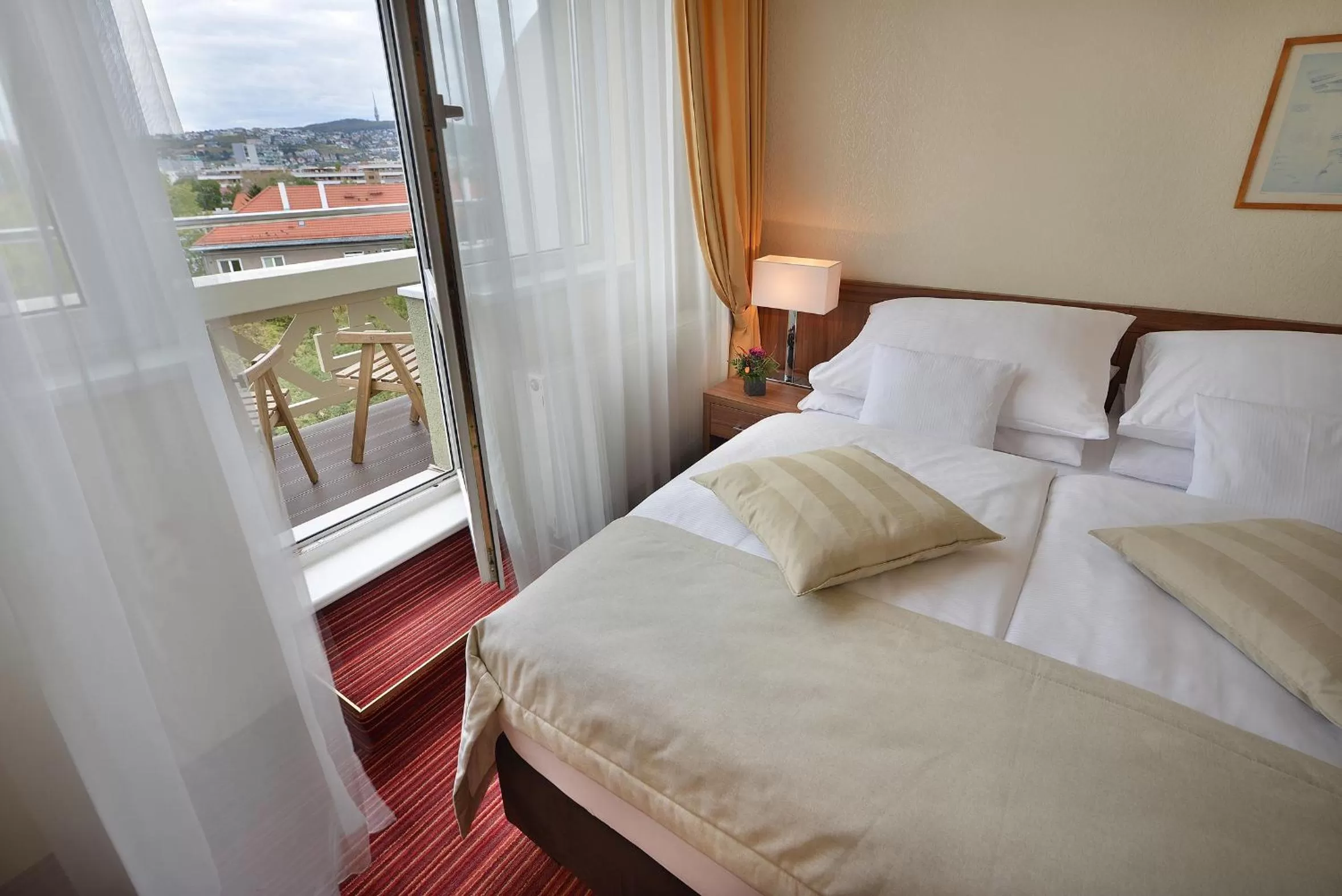 Balcony/Terrace, Bed in Apollo Hotel Bratislava