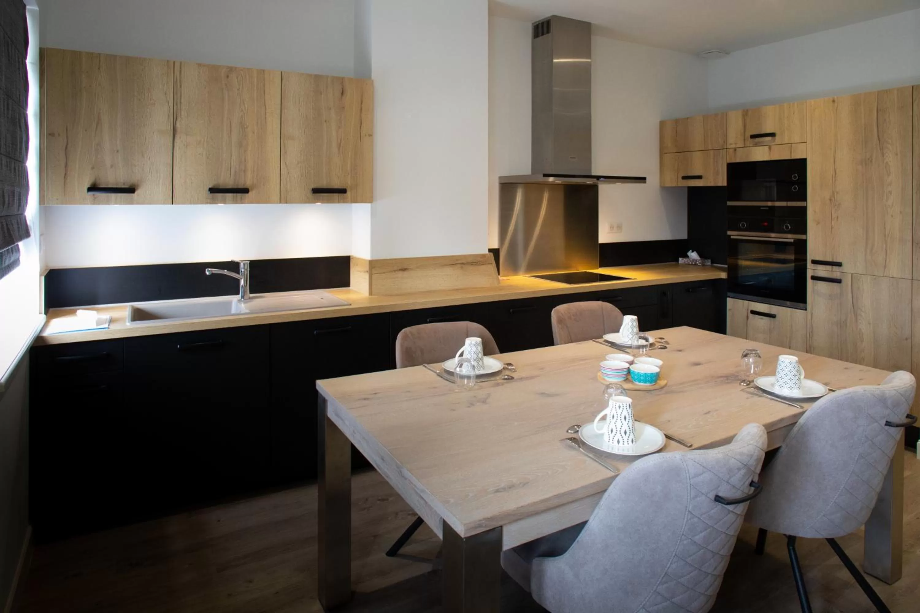 Kitchen or kitchenette in La Cave de l'Avenue de Champagne