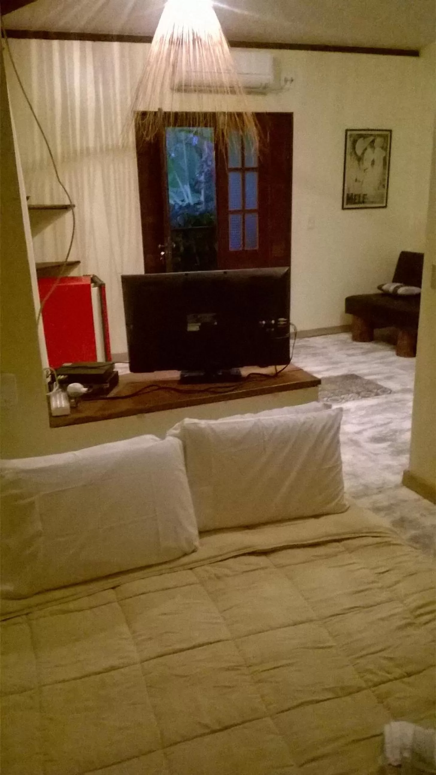 Bed, Seating Area in Pousada do Sonho