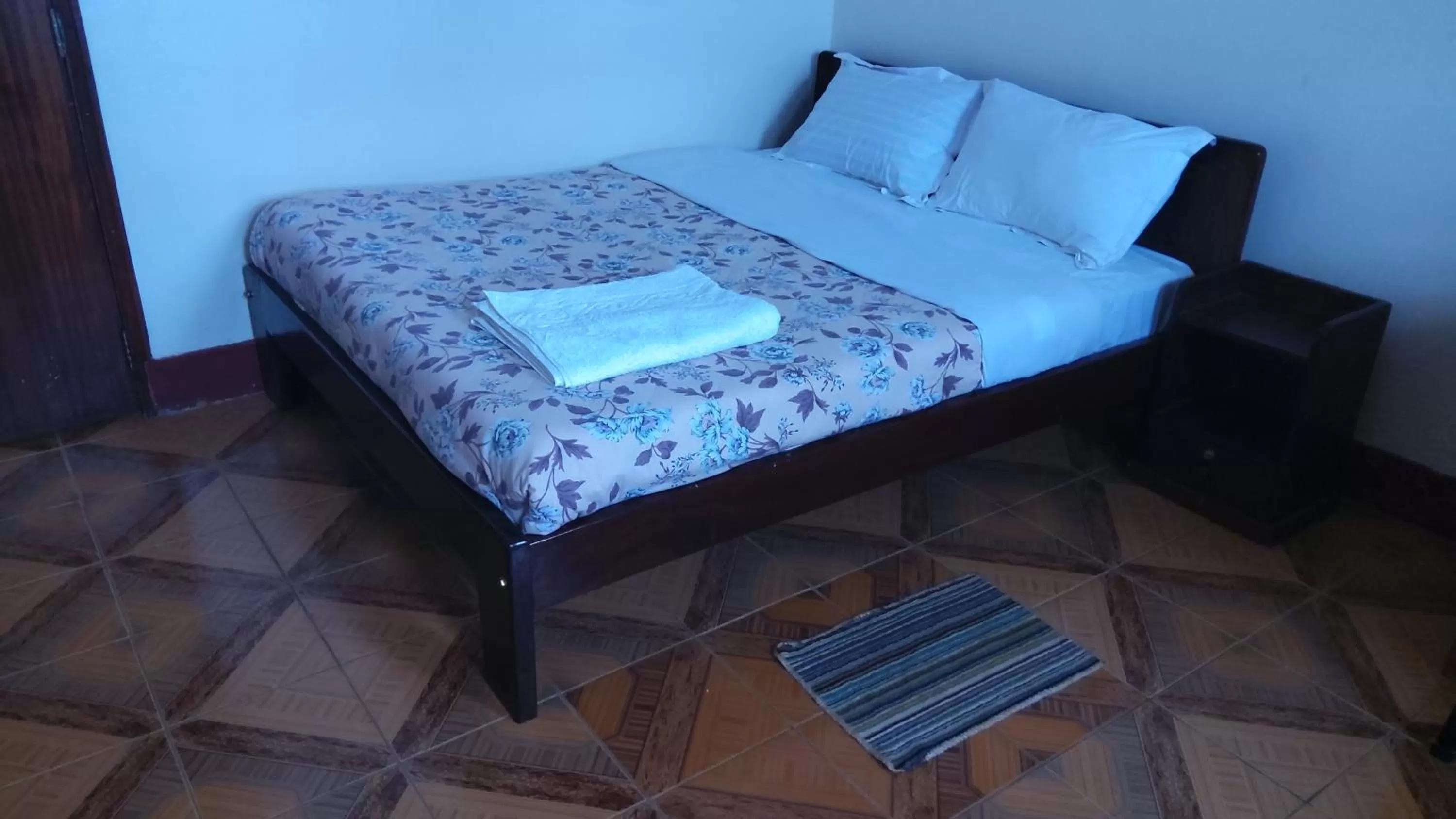 Bed in Lucia Villas Mbale