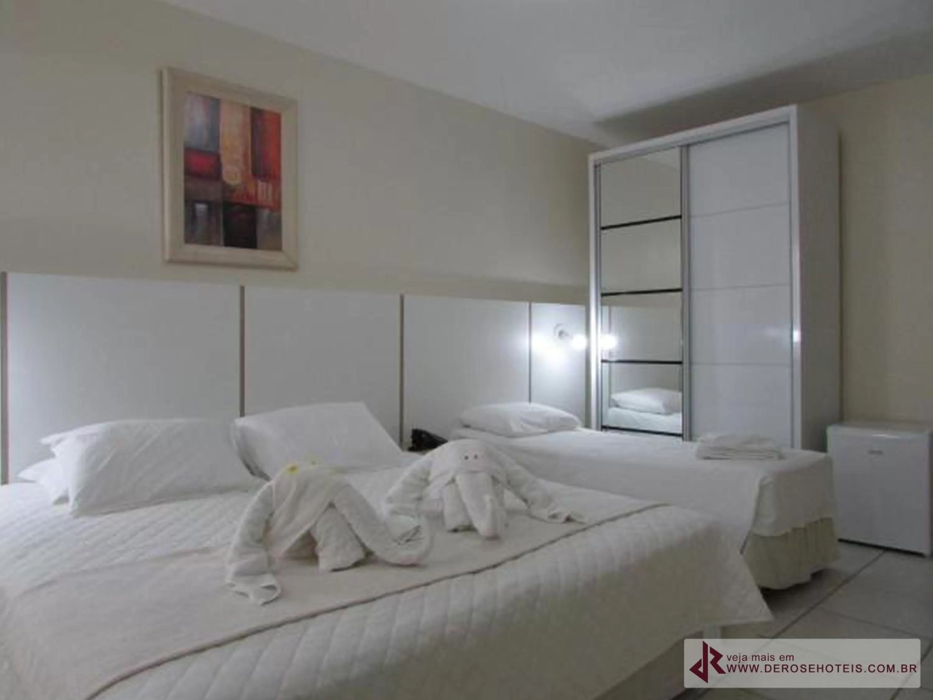 Bed in De Rose Palace Hotel