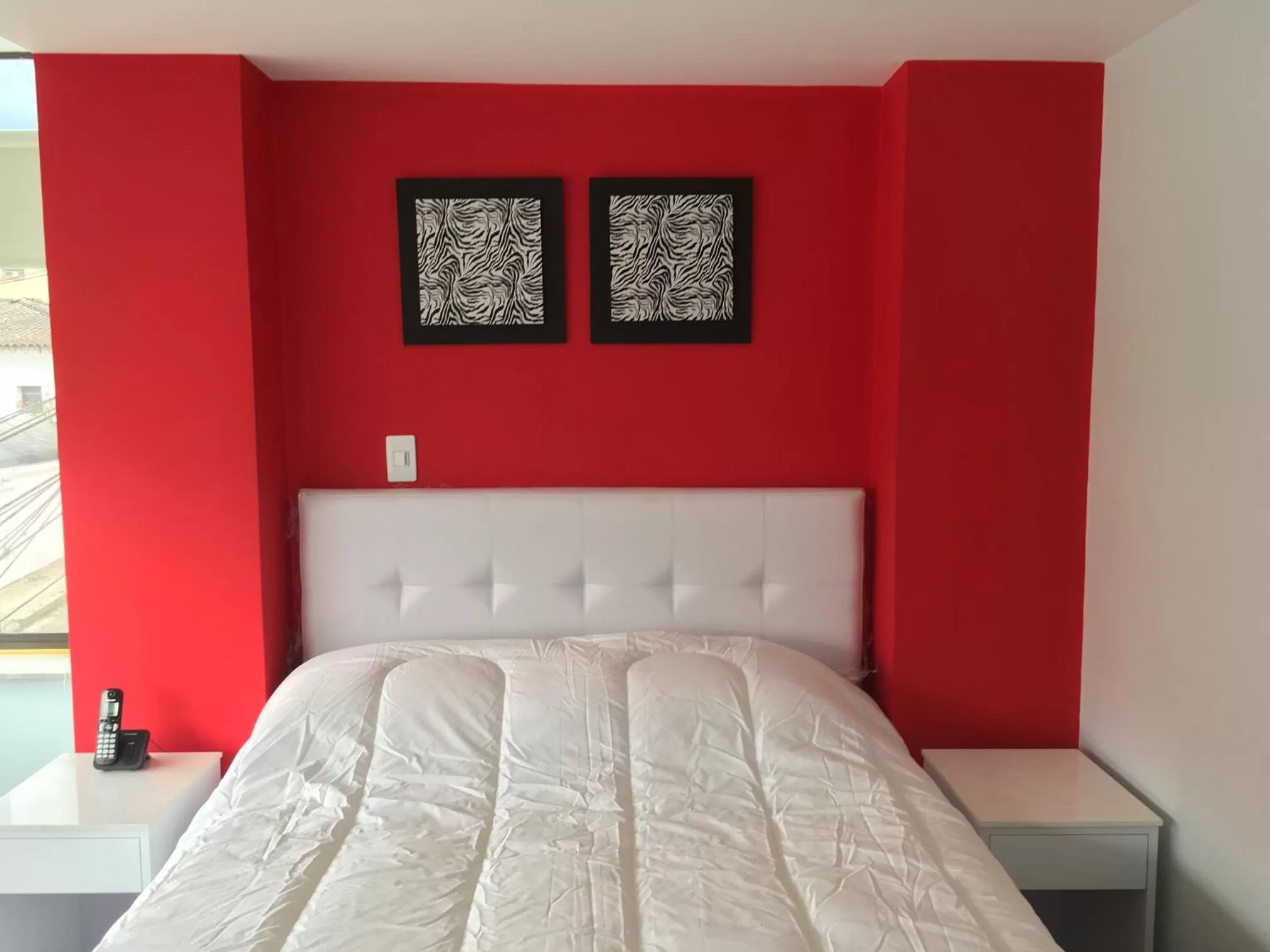 Bed in Hotel Garden City Boutique