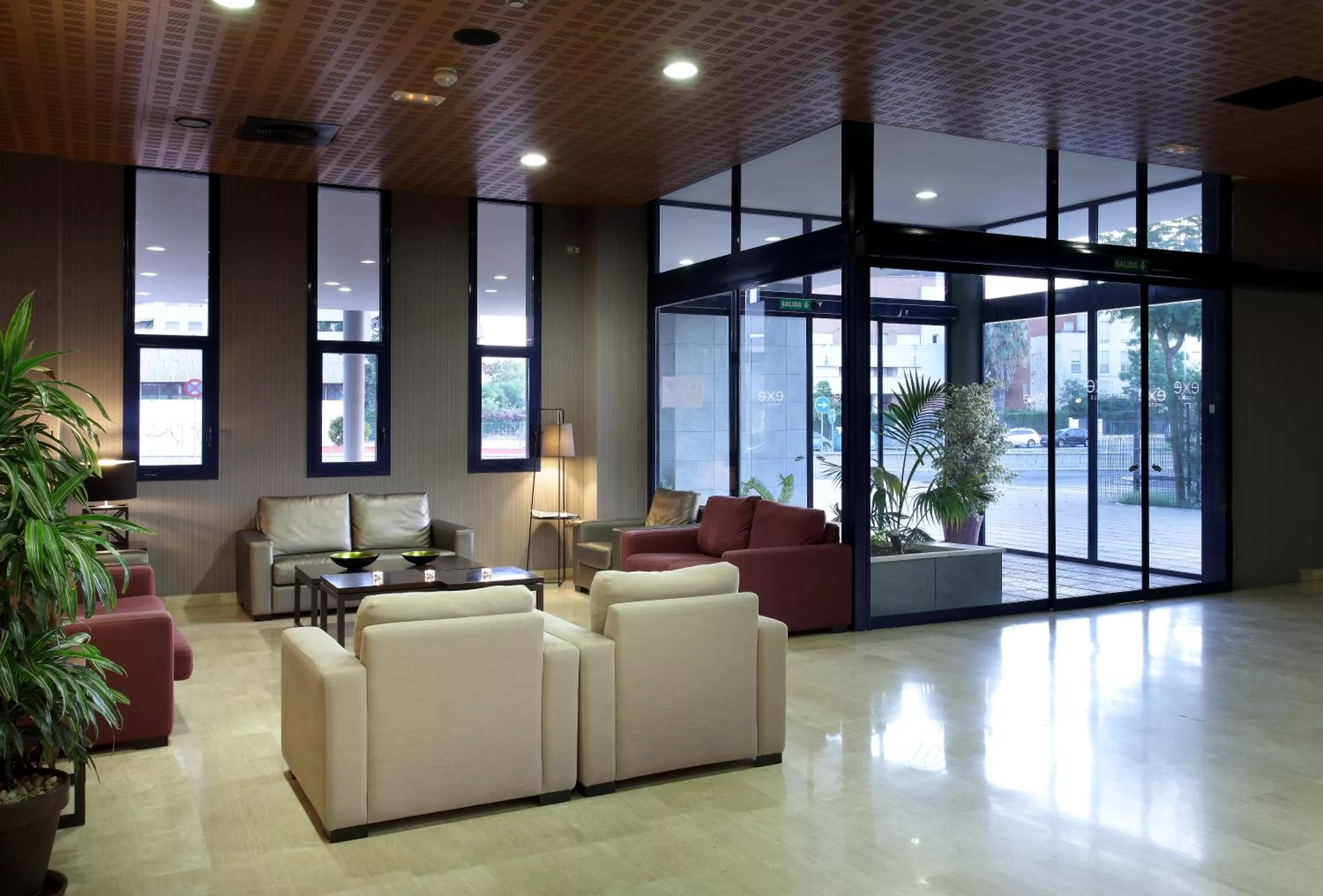 Lobby or reception in Exe Sevilla Palmera