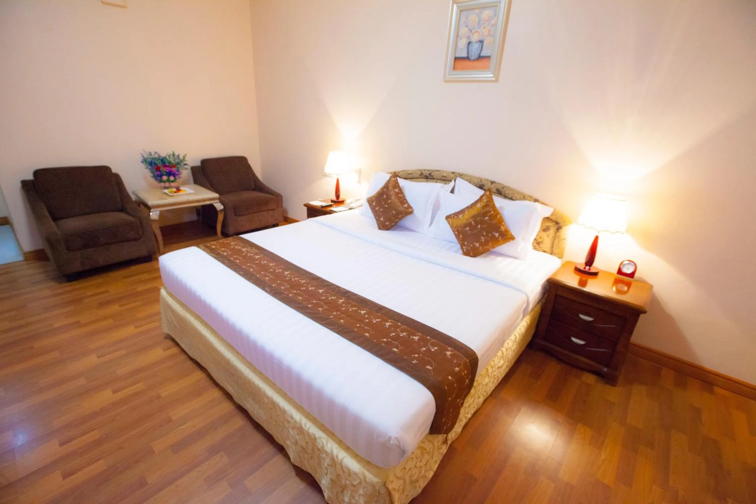 Bed in Grand Palace Hotel