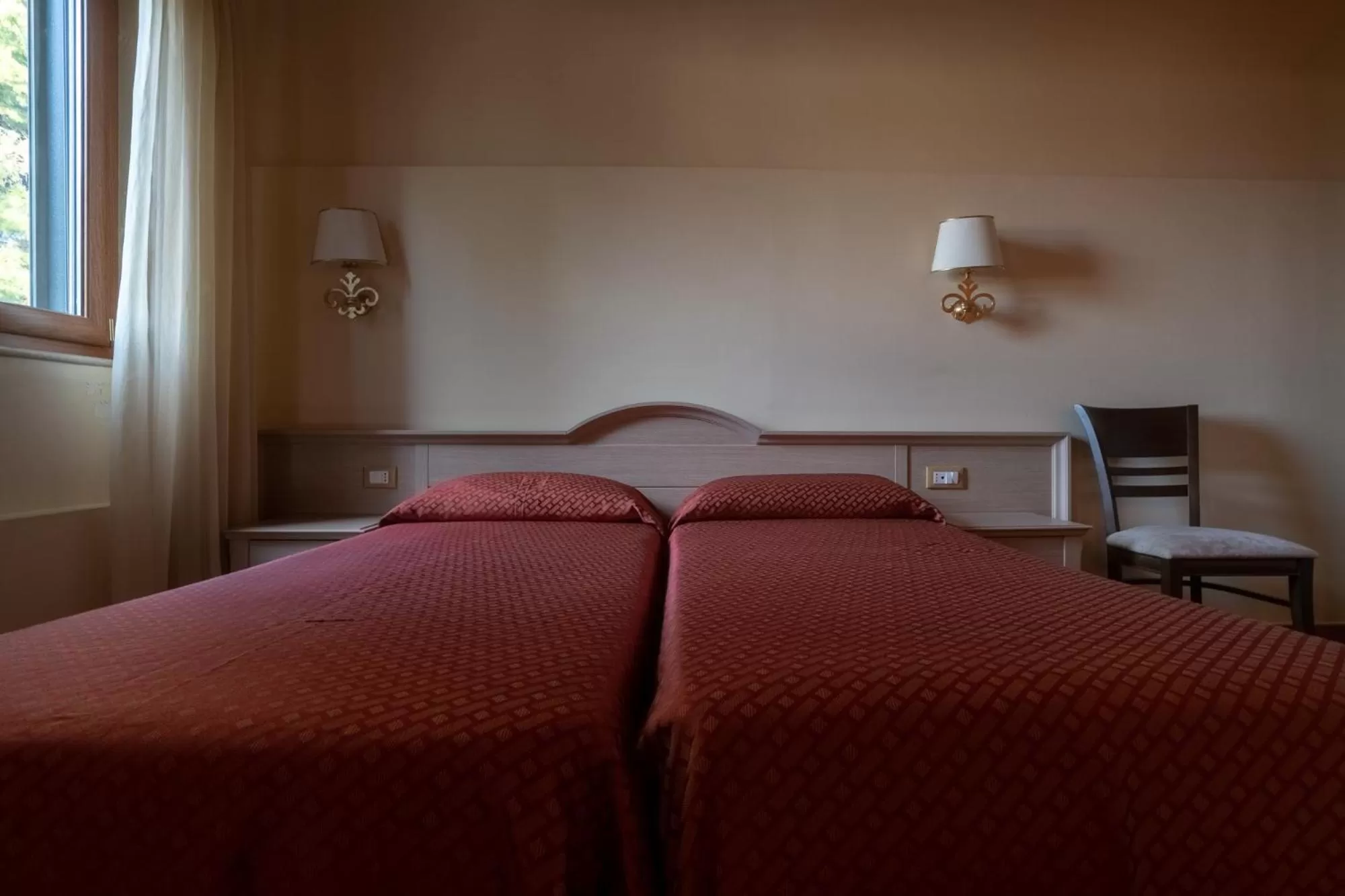 Bed in Hotel Don Giovanni