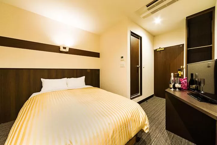 Bed in Hotel CASVI Tenjin