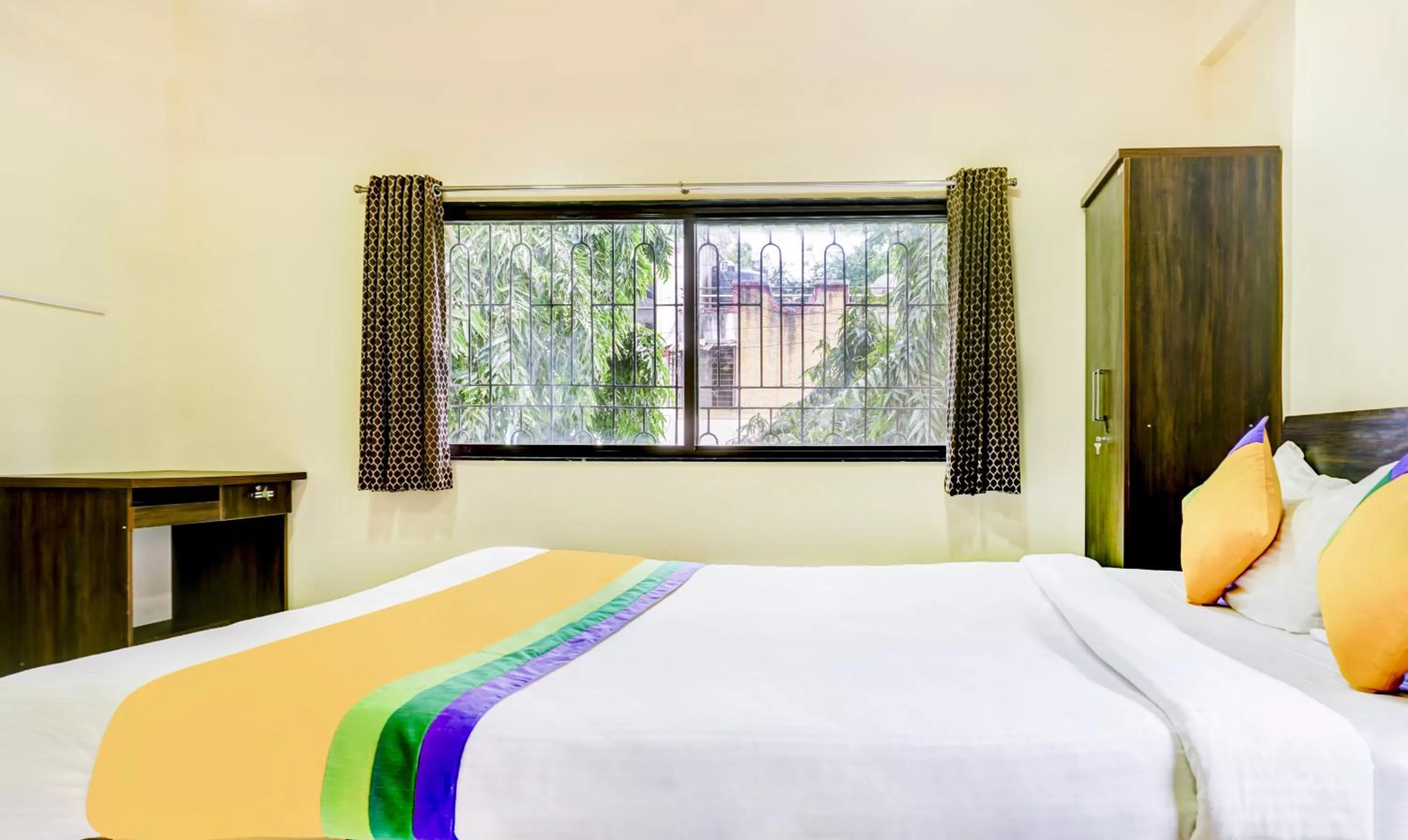 Photo of the whole room, Bed in Hotel Bestow Inn Koregaon Park Pune -Near Osho Ashram