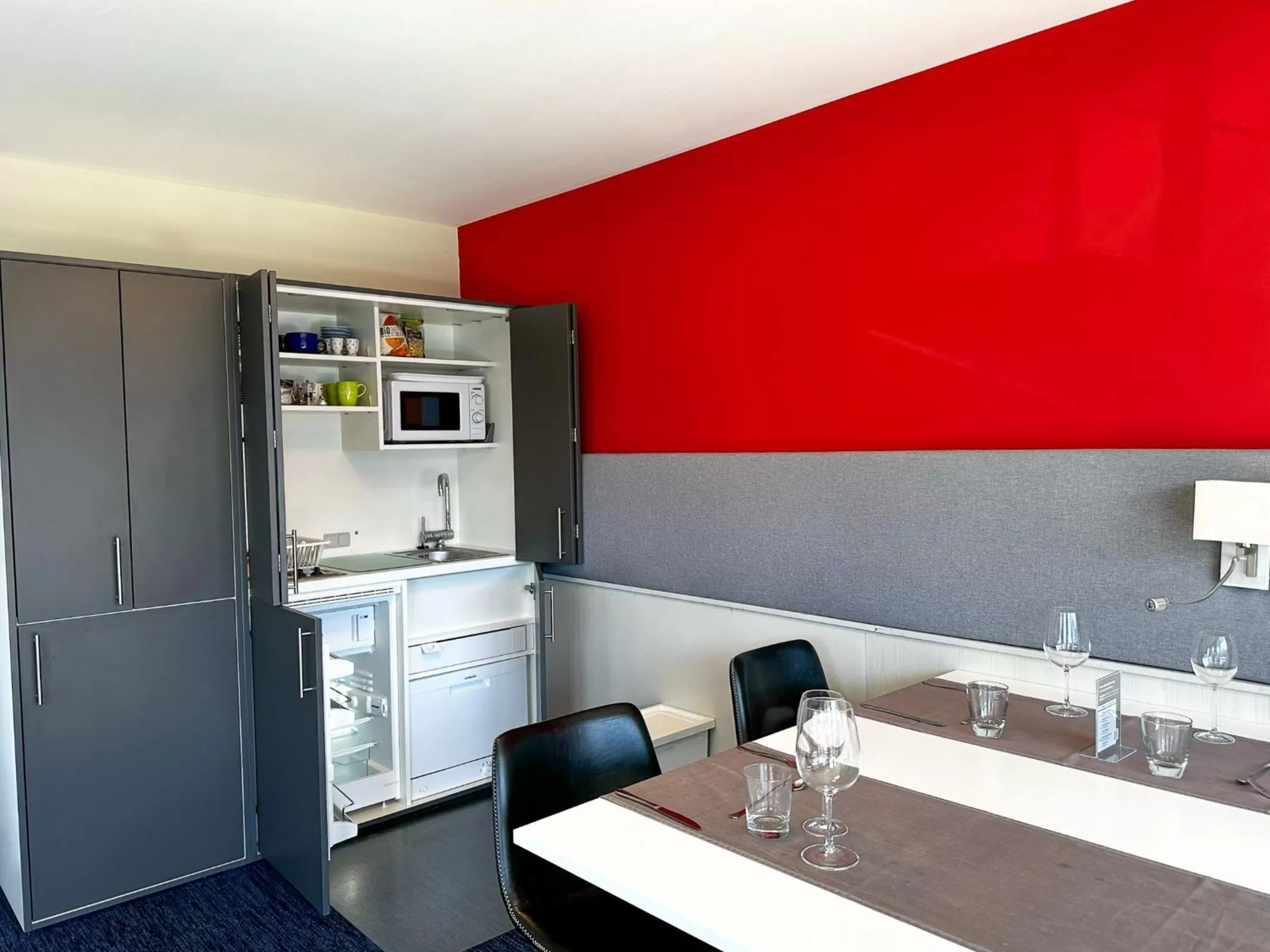 Kitchen or kitchenette in Seehotel Riviera at Lake Lucerne