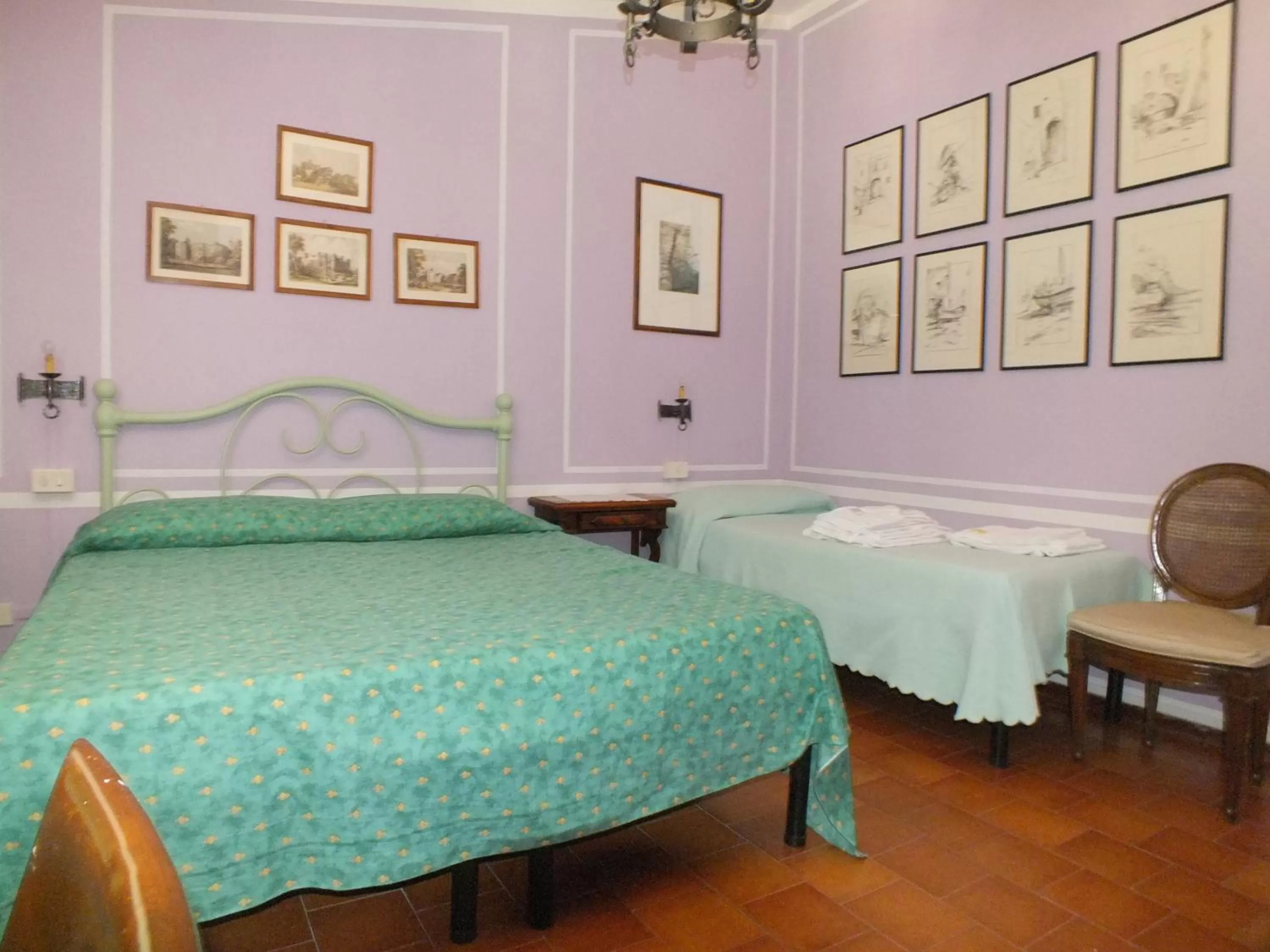 Photo of the whole room, Bed in Locanda Laudomia