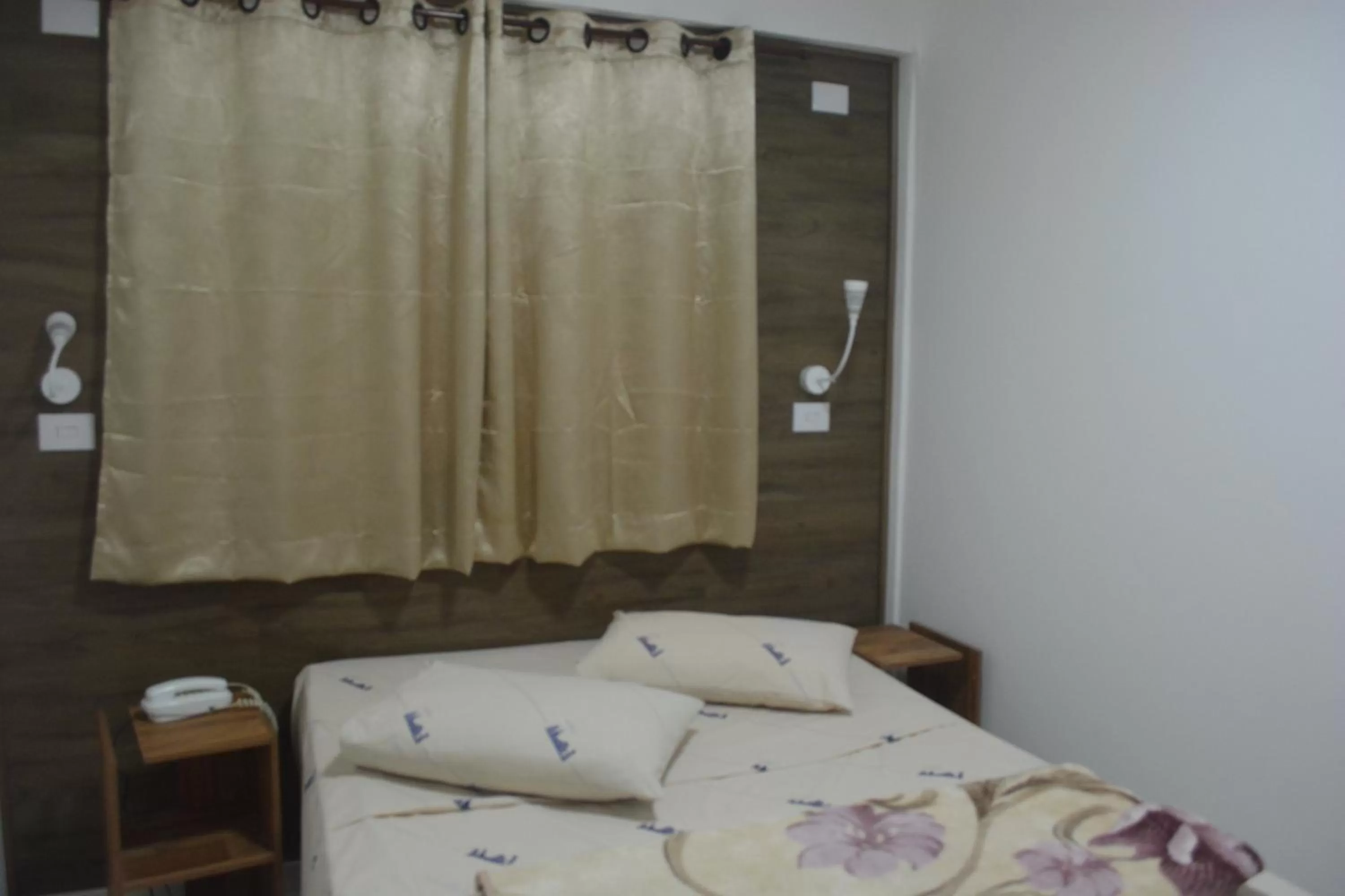 Bed in New Point Hotel