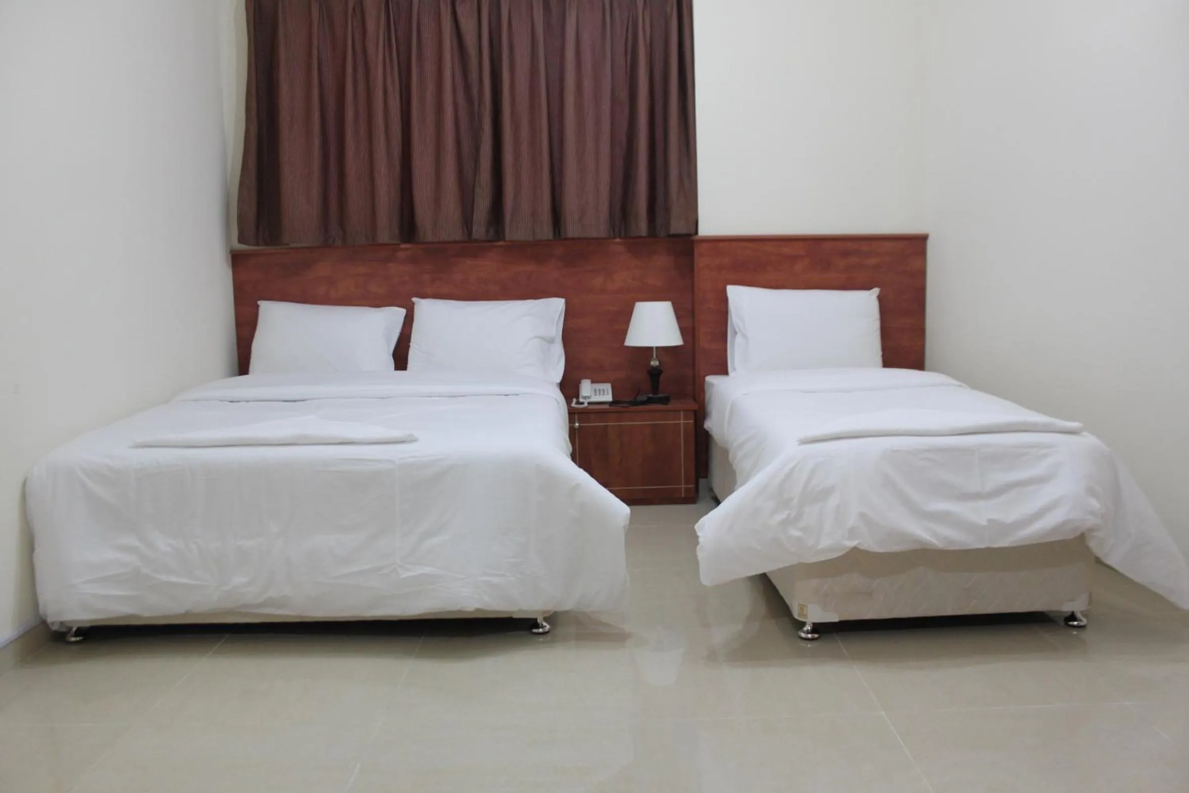 Bed in Africana Hotel