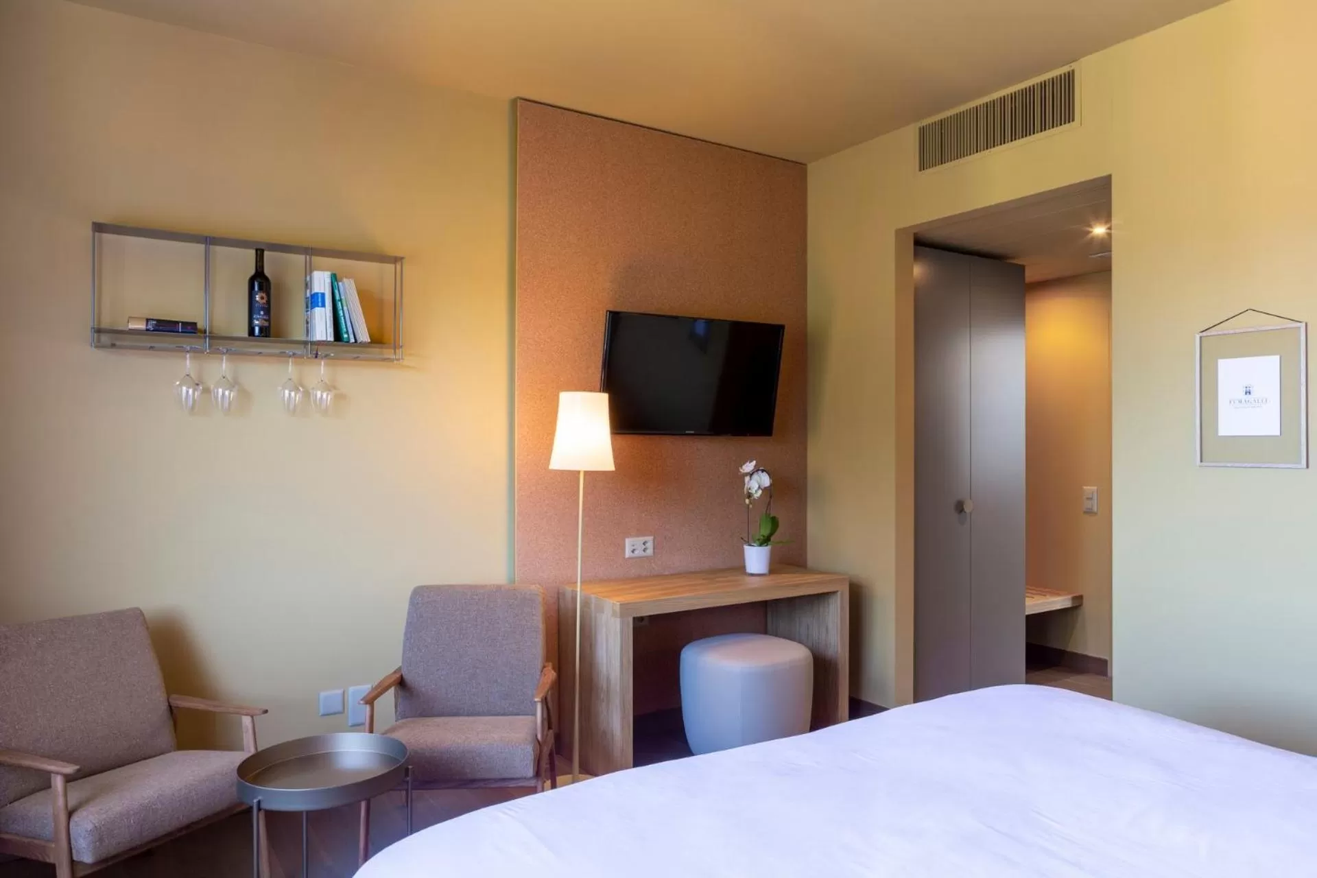 Bed in Conca Bella Boutique Hotel & Wine Experience