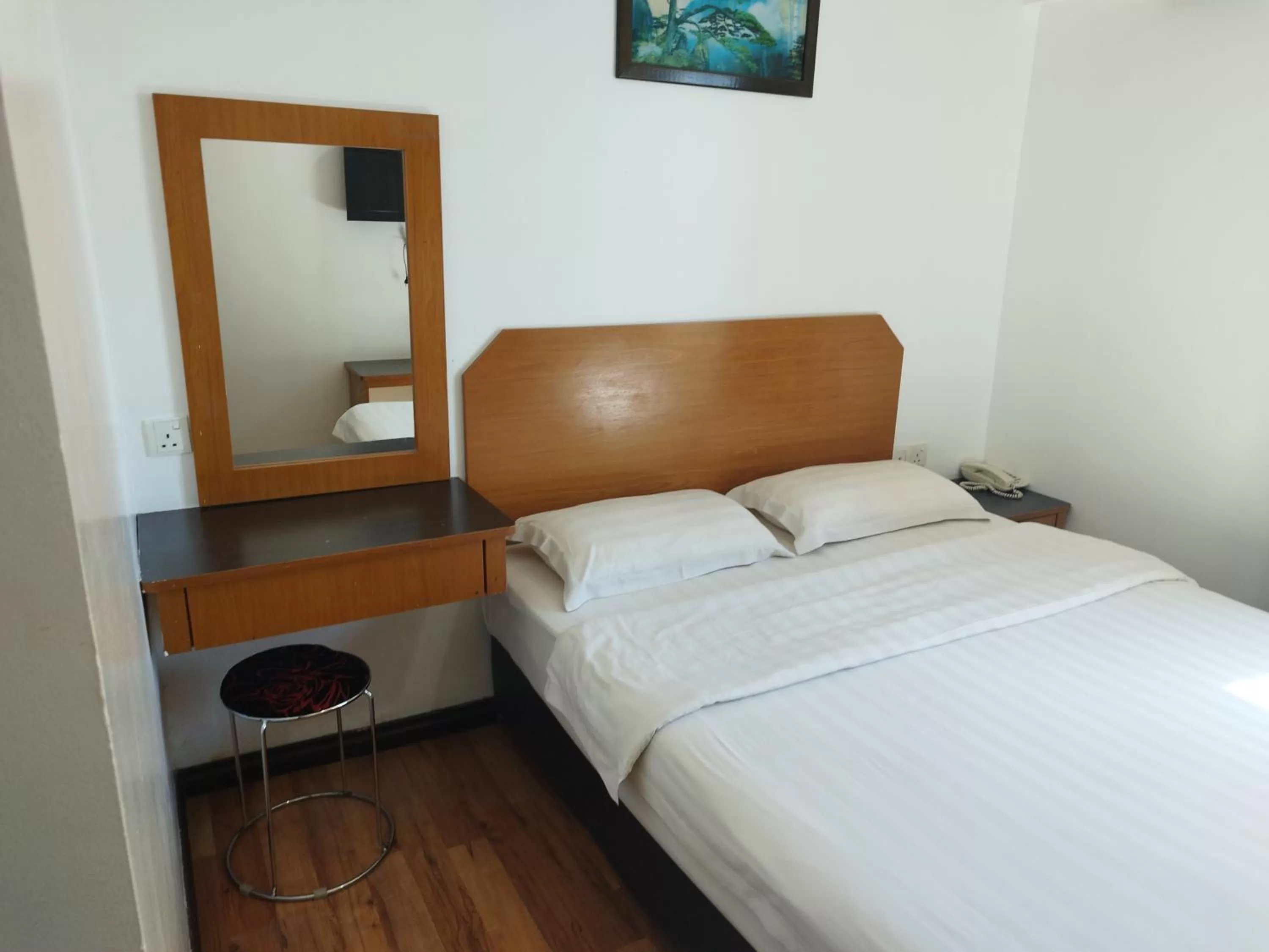 Bed in Marine Bay Hotel