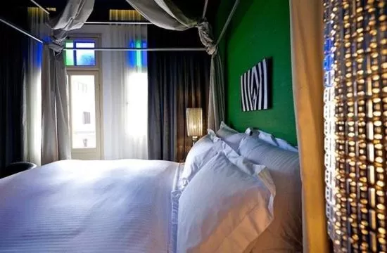 Bedroom in Alma Boutique Hotel & Lounge