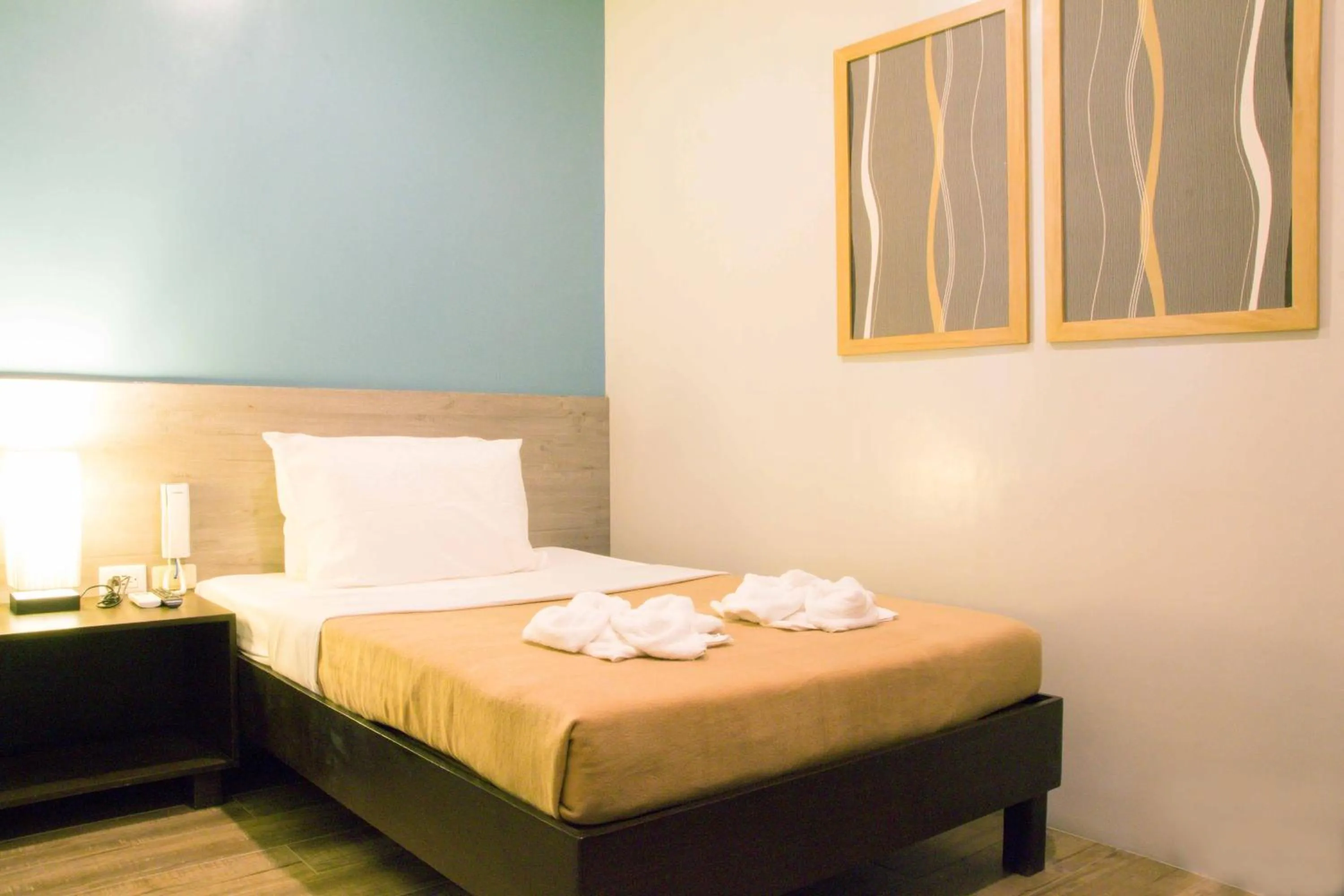 Bed in Sheridan Boutique Hotel