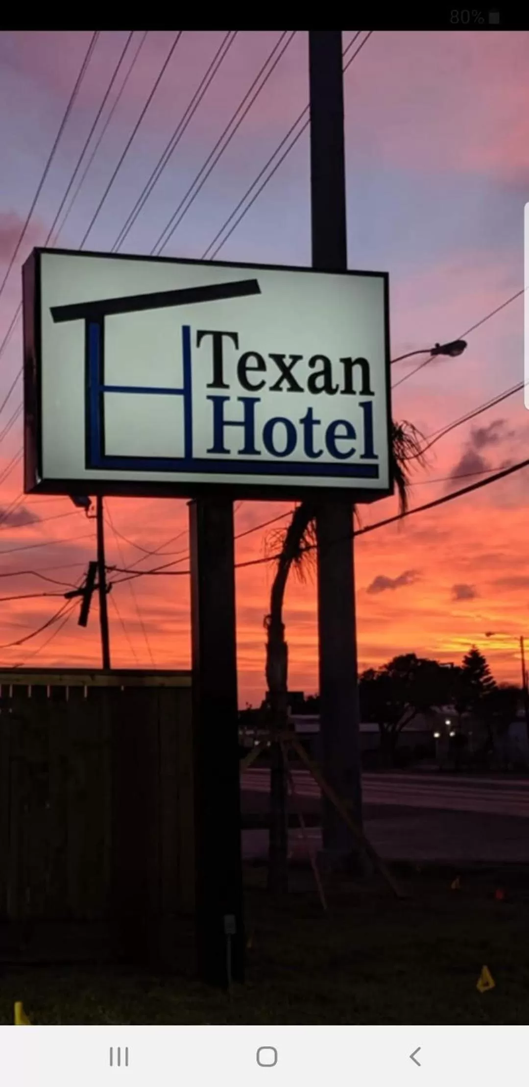 Property logo or sign in Texan Hotel