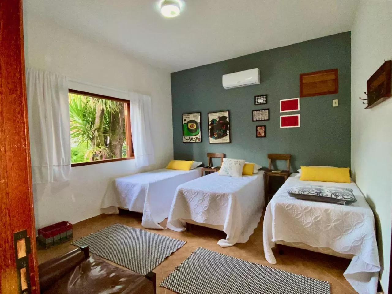 Bed in Pousada Nossa Terra