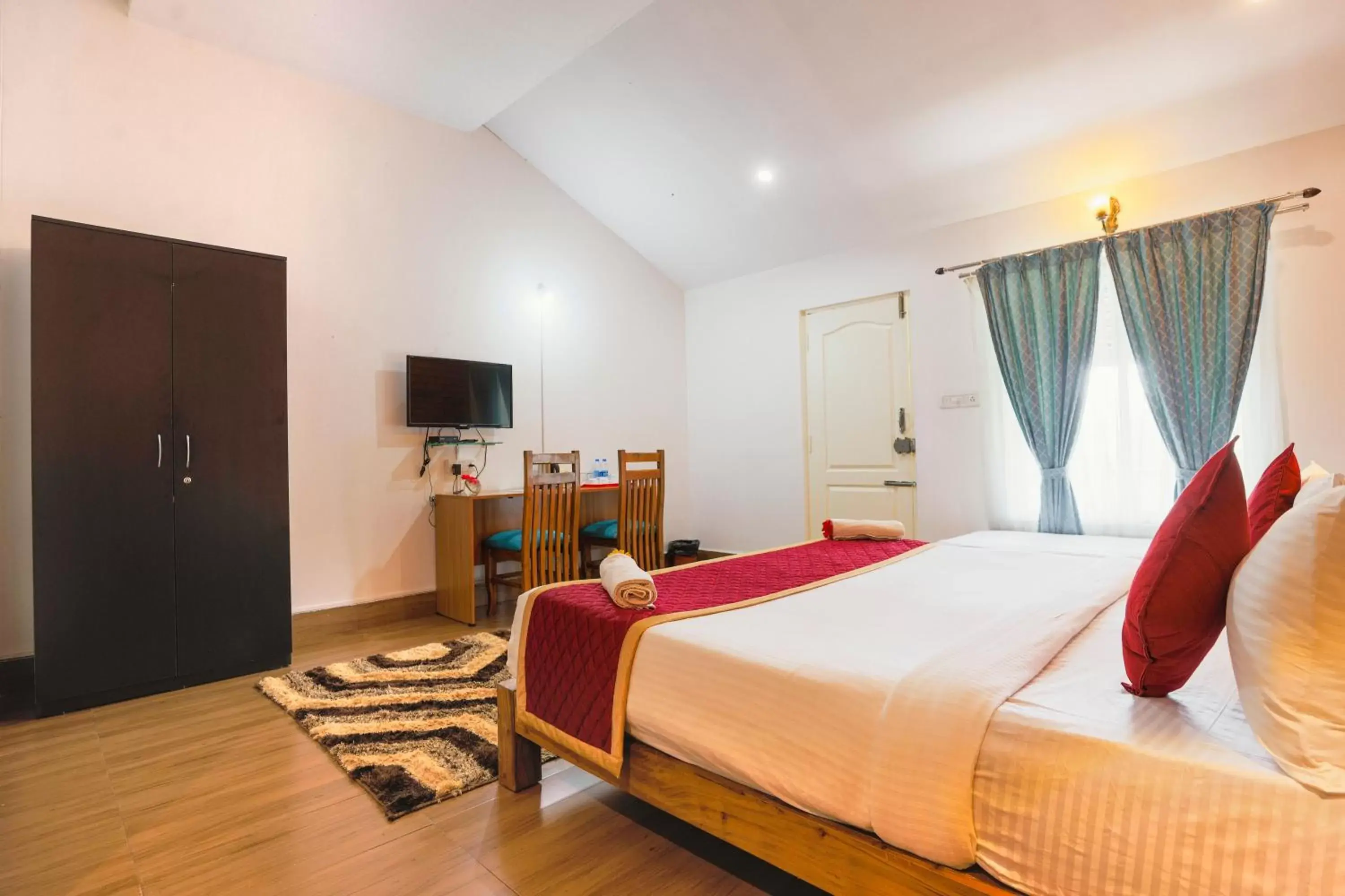 Deluxe Room with Balcony in The Spectrum Resort, Chikmagalur Deluxe Room with Balcony in The Spectrum Resort, Chikmagalur