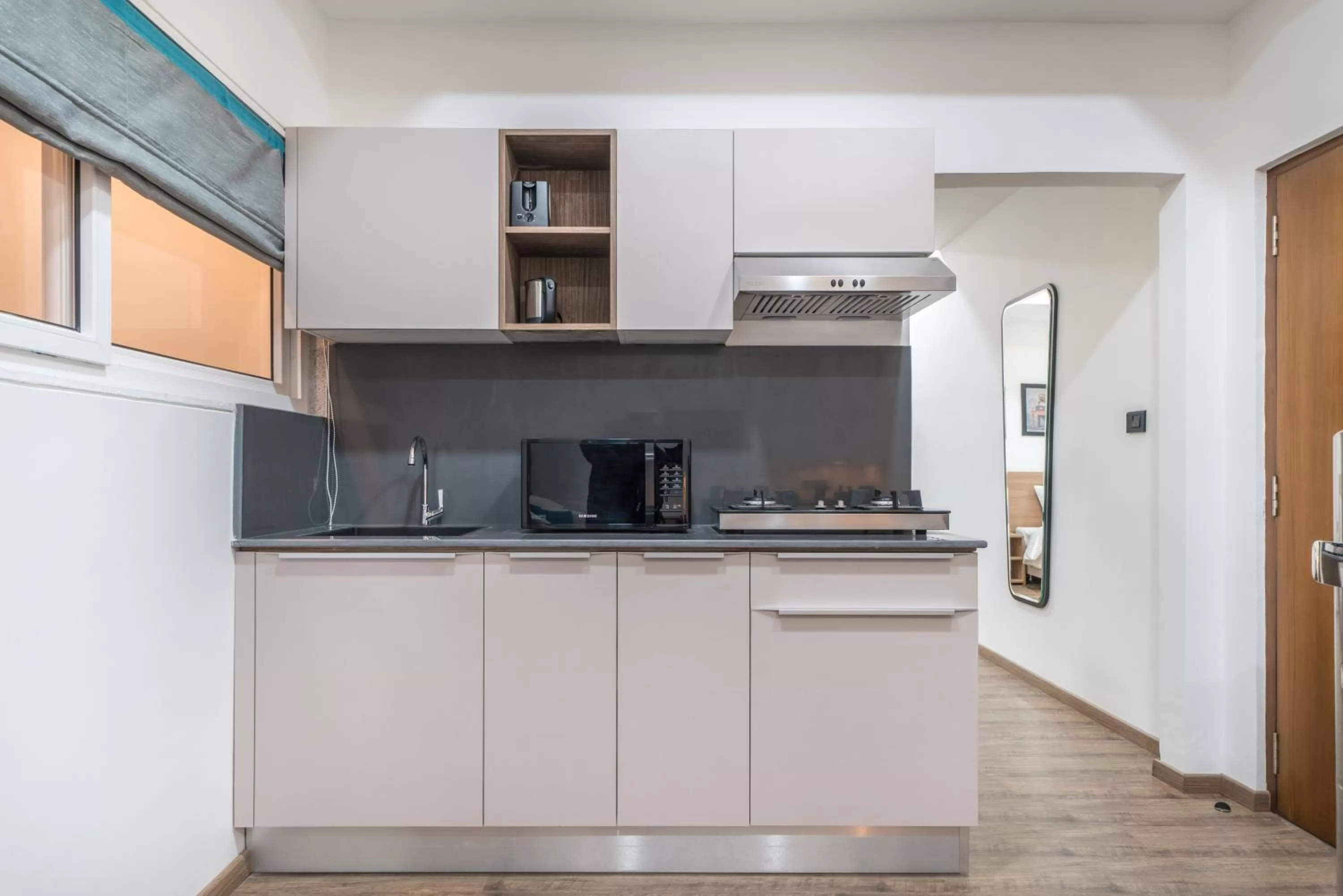 Kitchen or kitchenette in SKYLA Studios & Suites - Jubilee Hills