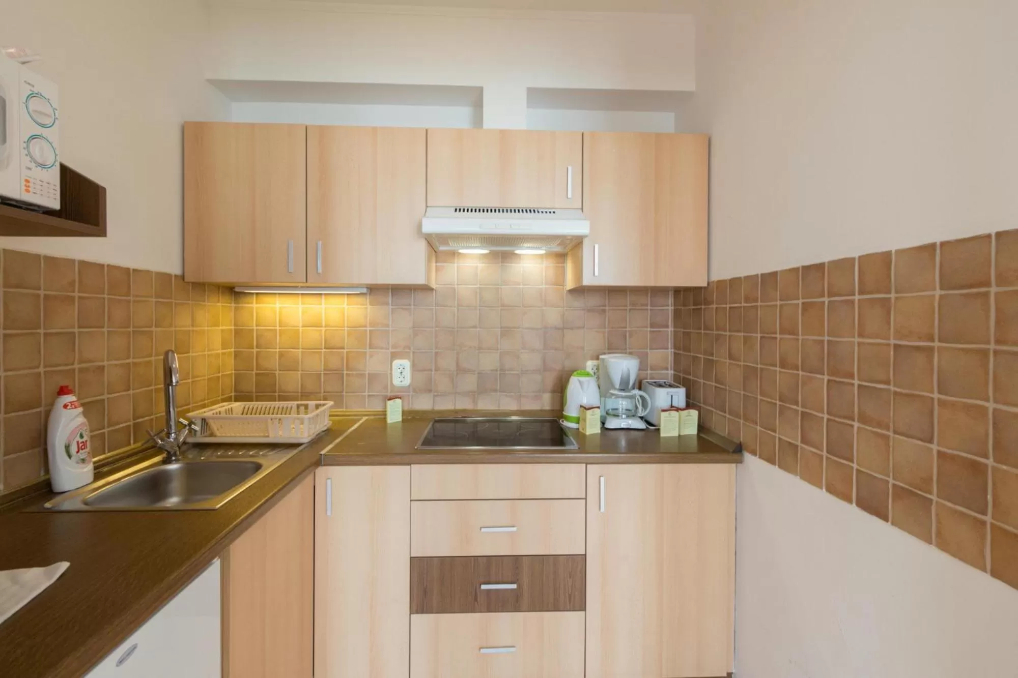 Kitchen or kitchenette in Premium Apartments