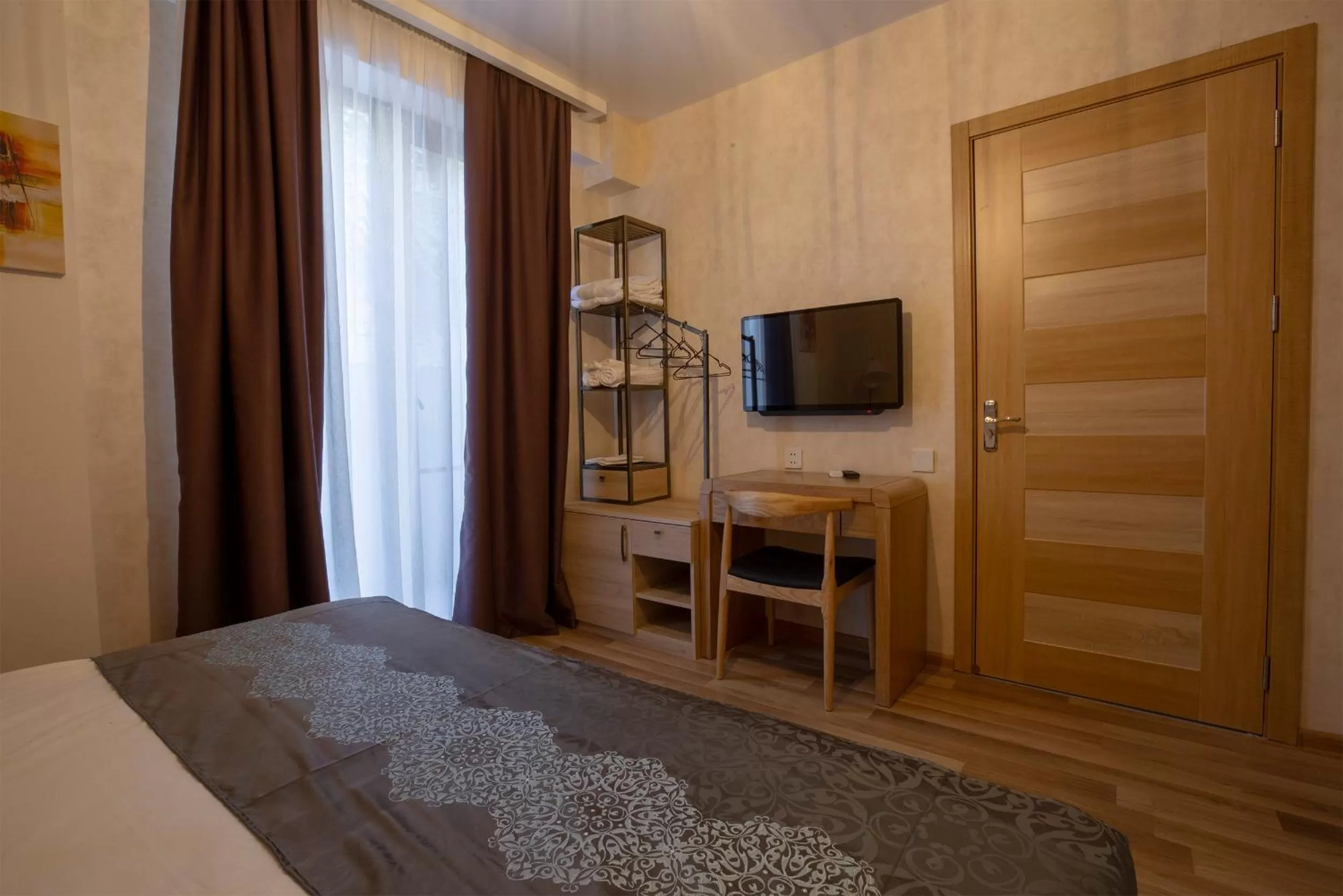 Communal lounge/ TV room, Bed in Ornament Boutique Hotel