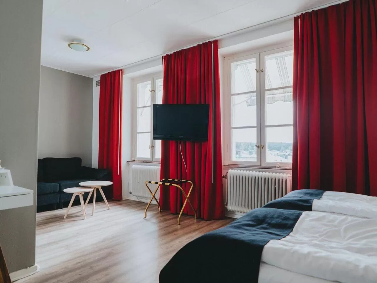 Photo of the whole room, Bed in Arboga Stadshotell