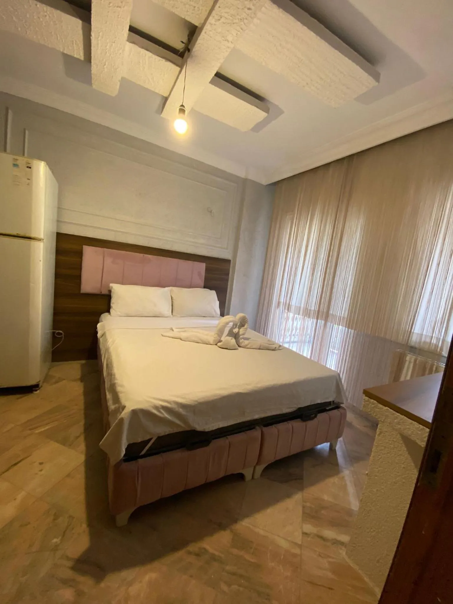 Bed in Aruna Boutique Hotel