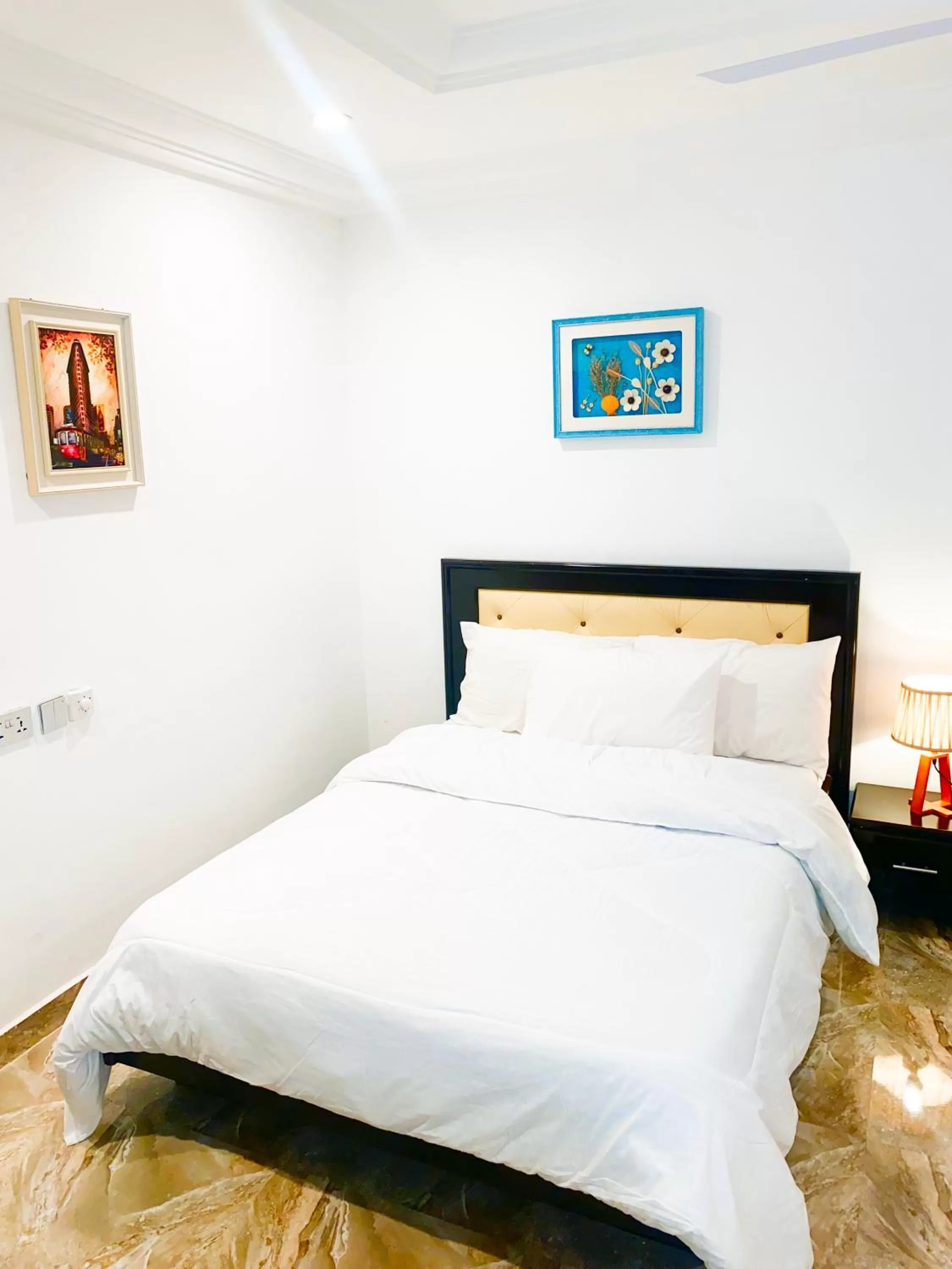 Bed in AIDEN HOMES AND APARTMENTS