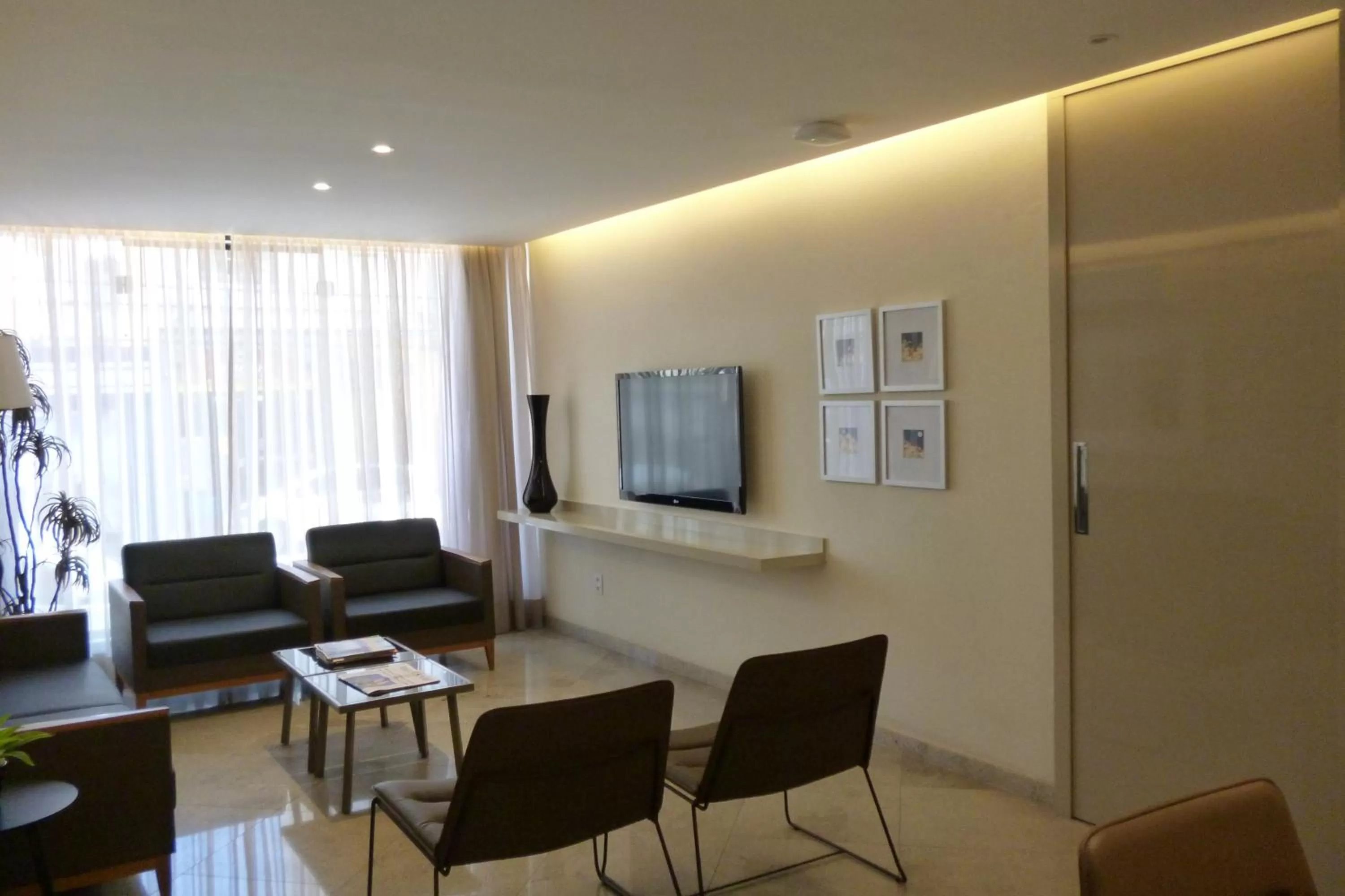 Communal lounge/ TV room, Seating Area in Hotel Cisne