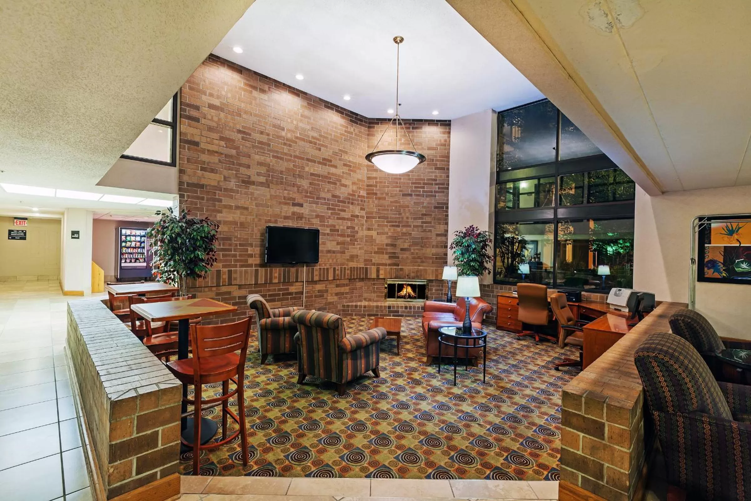 Lobby or reception in AmericInn by Wyndham Omaha